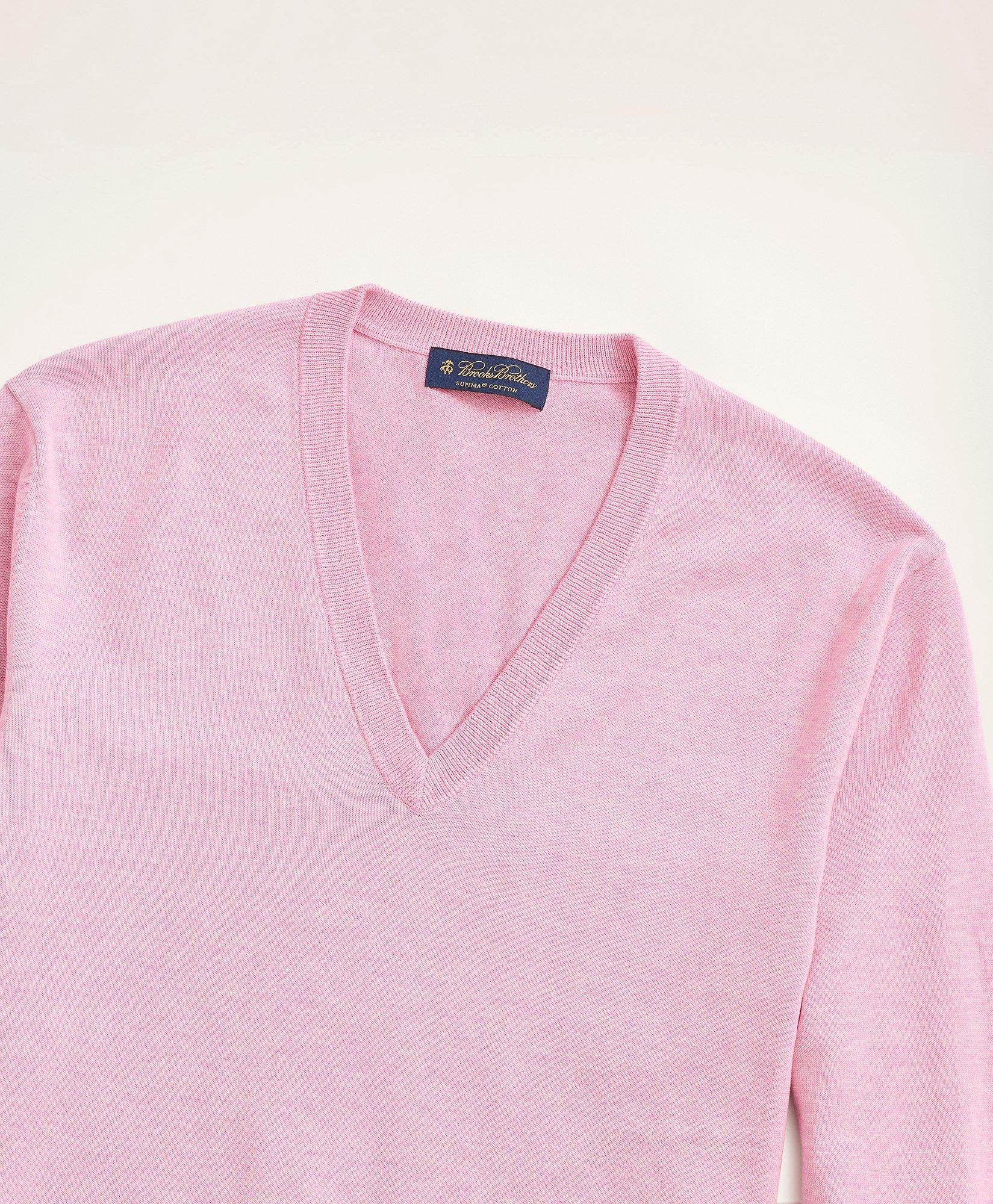 Roomy light pink sweater in merino wool