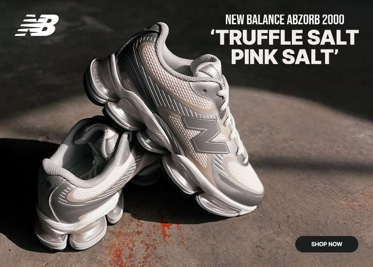 A promotional banner for the New Balance ABZORB 2000 features the sneaker in a colorway titled Truffle Salt Pink Salt. The image shows two views of the shoe: a full profile resting on a textured concrete surface under dramatic lighting, and a close-up detail shot highlighting the laces, mesh upper, and silver metallic overlays.
