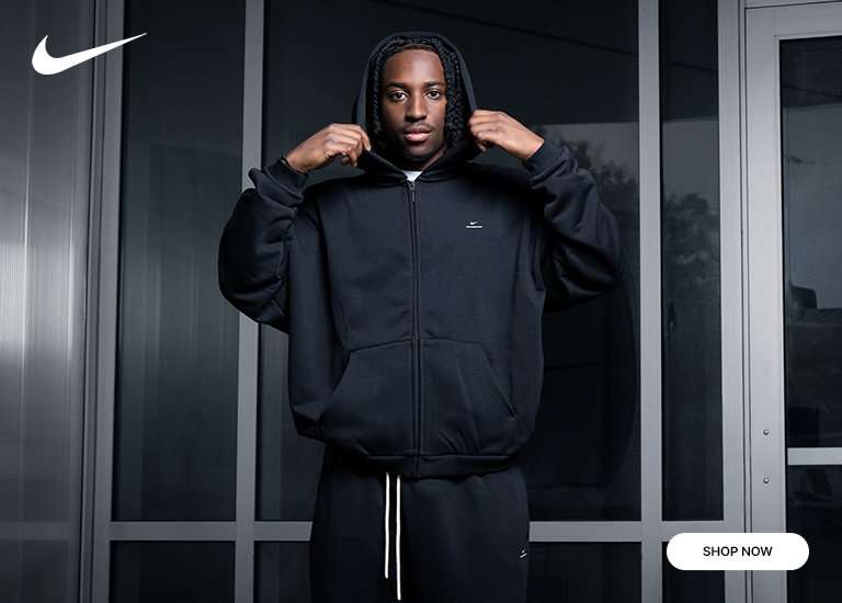 Man wearing Nike Men's Standard Issue Fleece Set