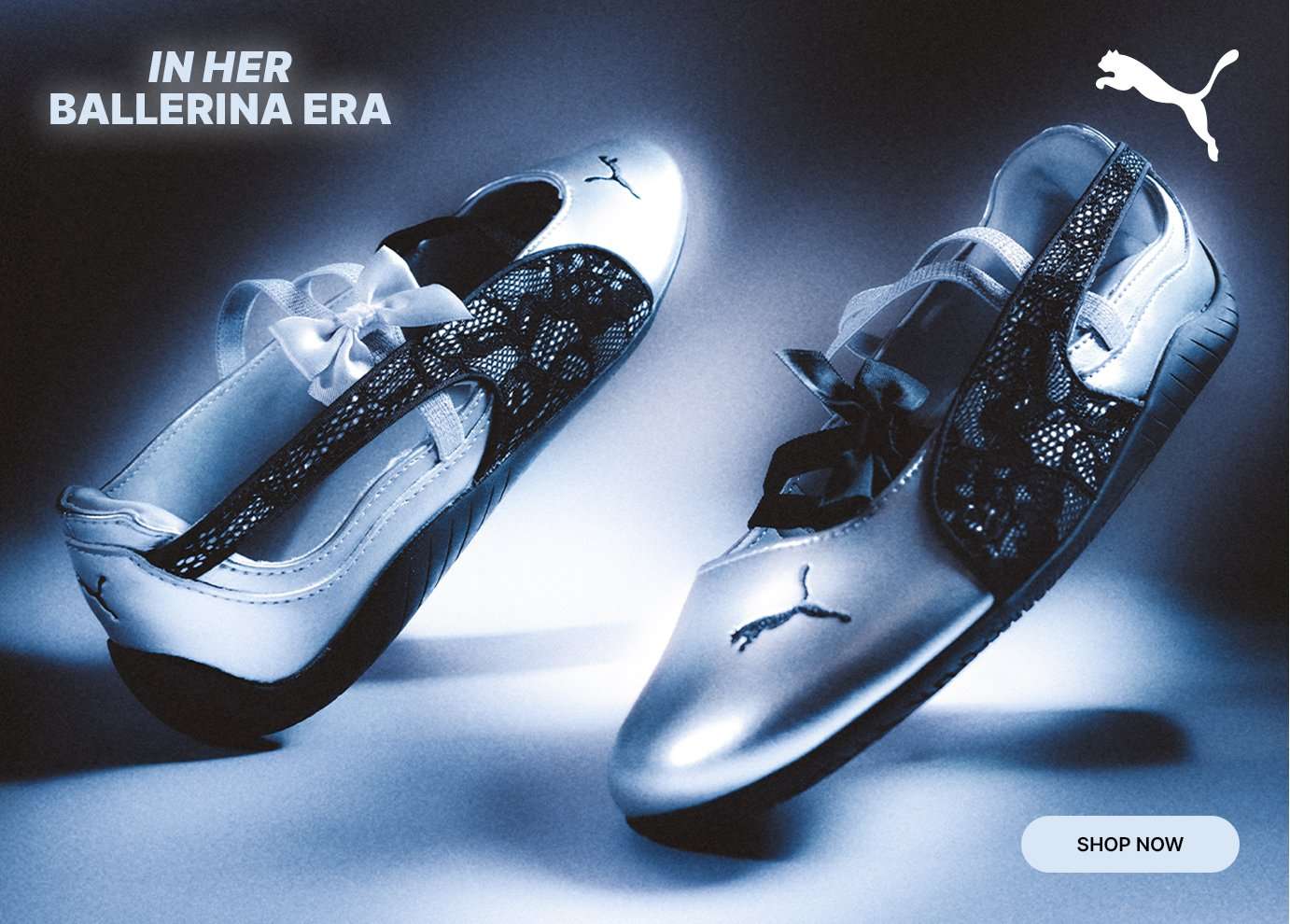 PUMA Speedcat Ballet sneakers in white and black with ribbon laces against a glowing blue backdrop.