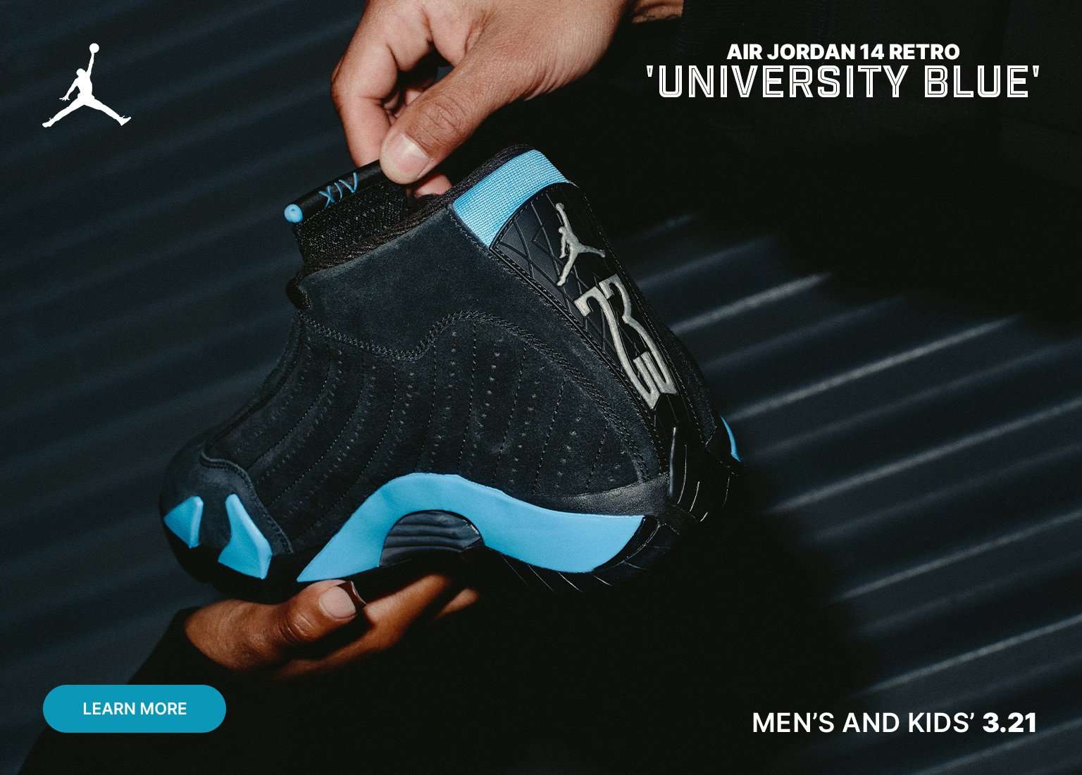 A promotional banner featuring a pair of hands holding the Air Jordan 14 Retro University Blue sneaker. The shoe has a black suede upper with vibrant blue accents on the midsole and heel. The Jumpman logo and the number 23 are visible on the heel. Text on the image reads AIR JORDAN 14 RETRO UNIVERSITY BLUE and MENS AND KIDS 3.21, with a LEARN MORE button in the bottom left corner.