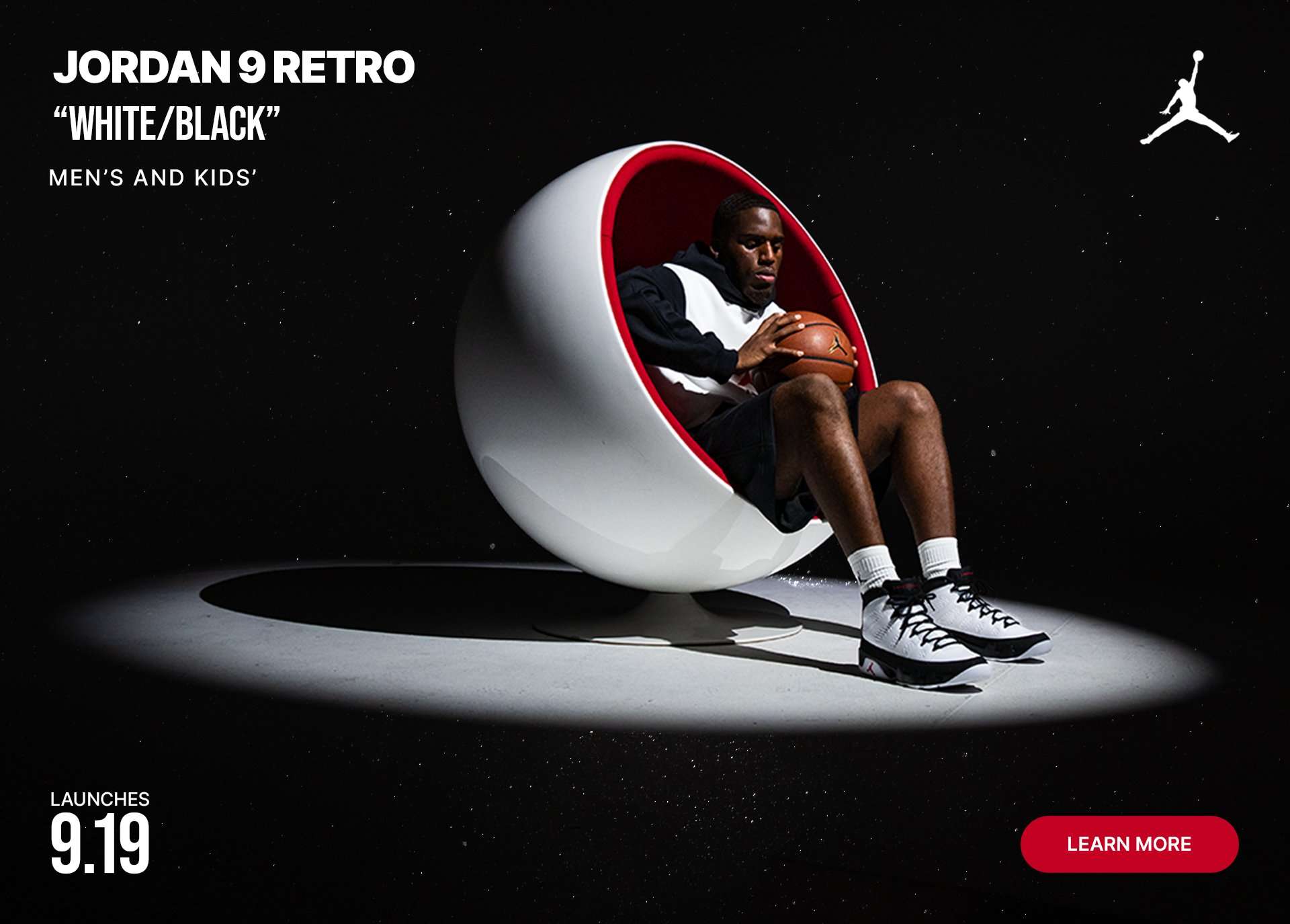 Jordan Retro 9 White/Black sneakers featured in a basketball-inspired promotional campaign.