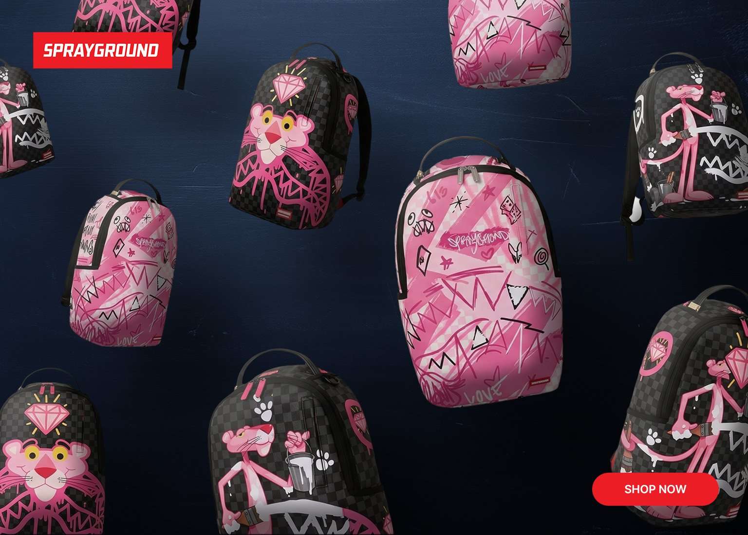 A mobile promotional banner for Sprayground backpacks featuring a collaboration with the Pink Panther against a dark textured blue background. Multiple backpacks float across the screen, highlighting two main styles: one featuring a pink graffiti-and-doodle pattern, and another with a black-and-grey checkerboard pattern showcasing graphics of the Pink Panther and large pink diamonds. A red SPRAYGROUND logo is in the top left corner, and a red SHOP NOW button sits in the bottom right corner. 