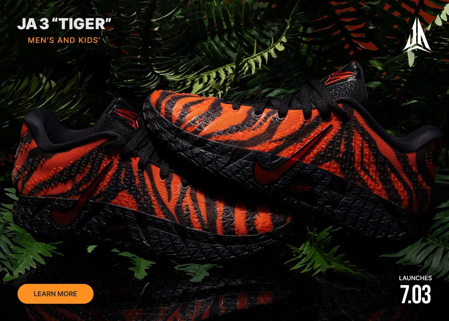 Promotional image for the JA 3 TIGER basketball shoes in men's and kids' sizes. The sneakers feature an orange and black tiger-stripe pattern and are displayed amidst green ferns. The image includes a LEARN MORE button and states the release date as 7.03.