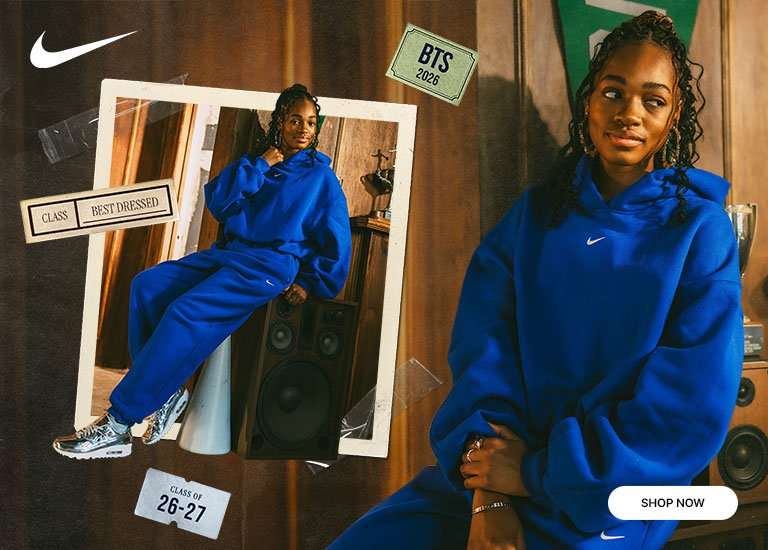 Nike back-to-school fleece set in royal blue with matching hoodie, joggers, and sneakers.
