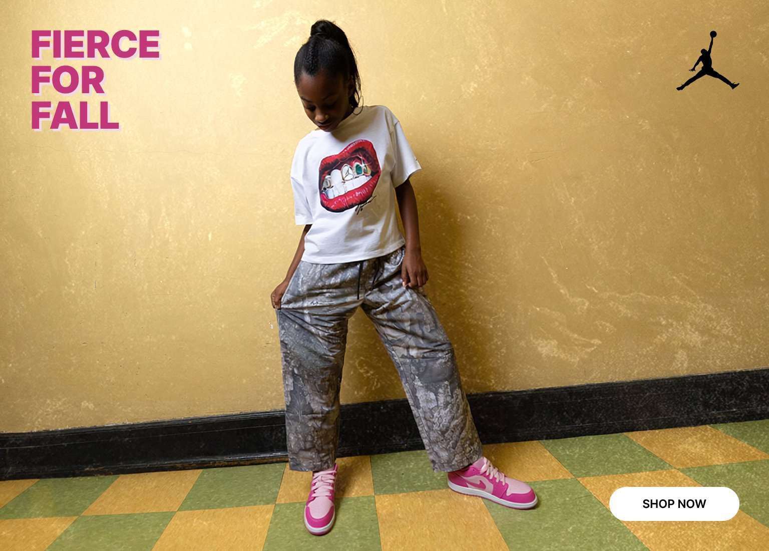 Kid wearing a graphic tee, patterned pants, and pink Air Jordan sneakers, with a close-up of the pink sneakers featured alongside.