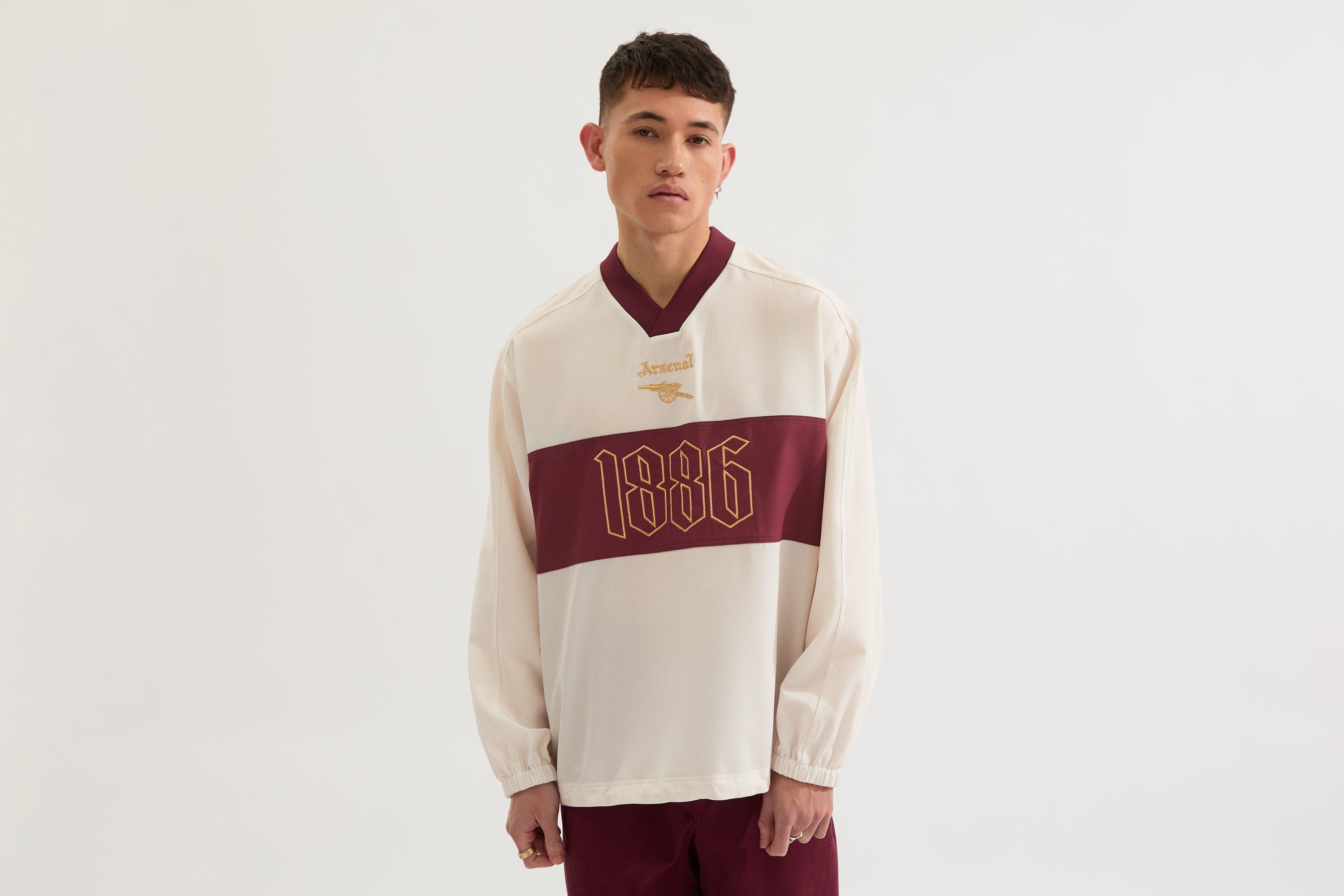 Arsenal North London Classic White Shell Top | Official Online Store