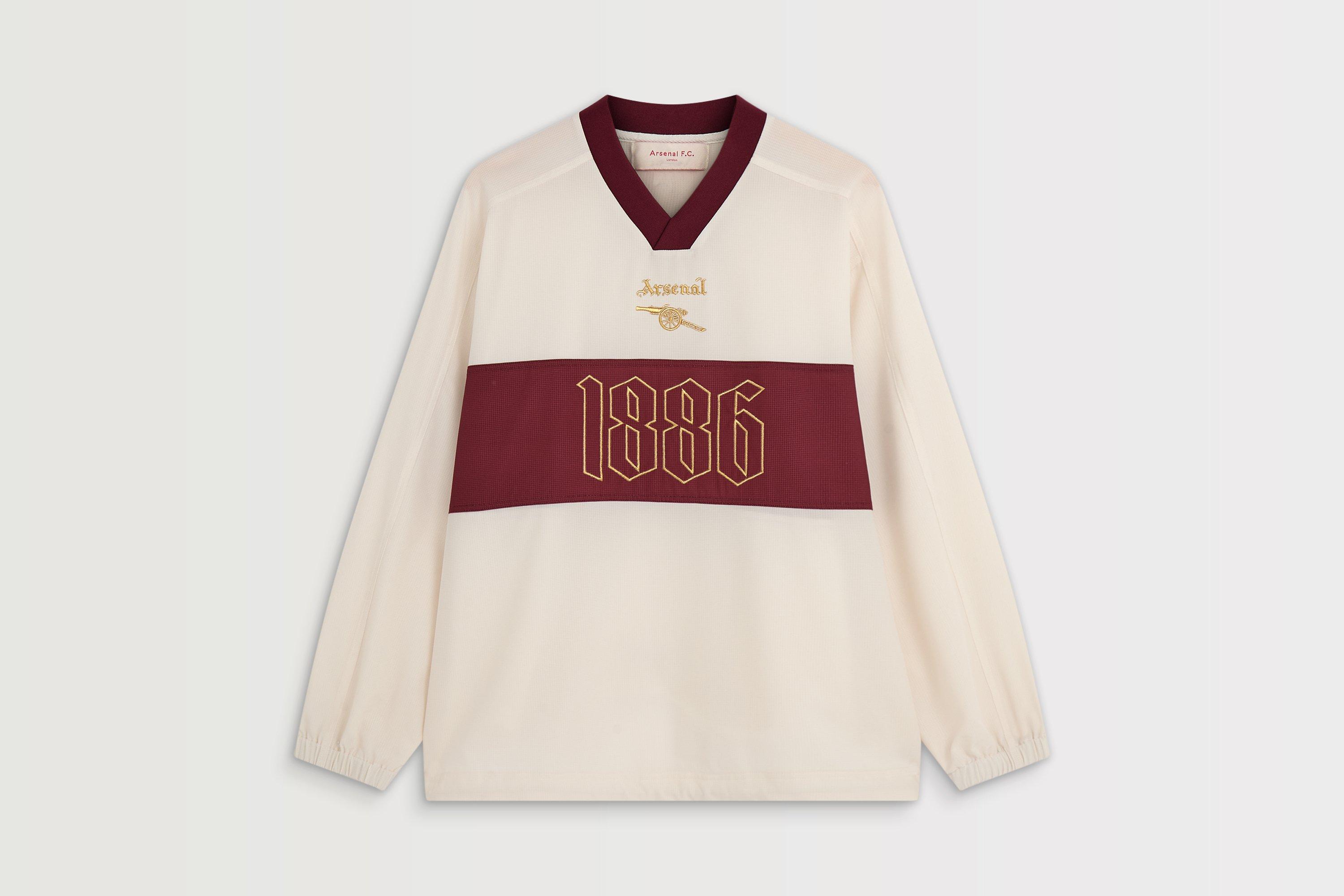Arsenal North London Classic White Shell Top | Official Online Store