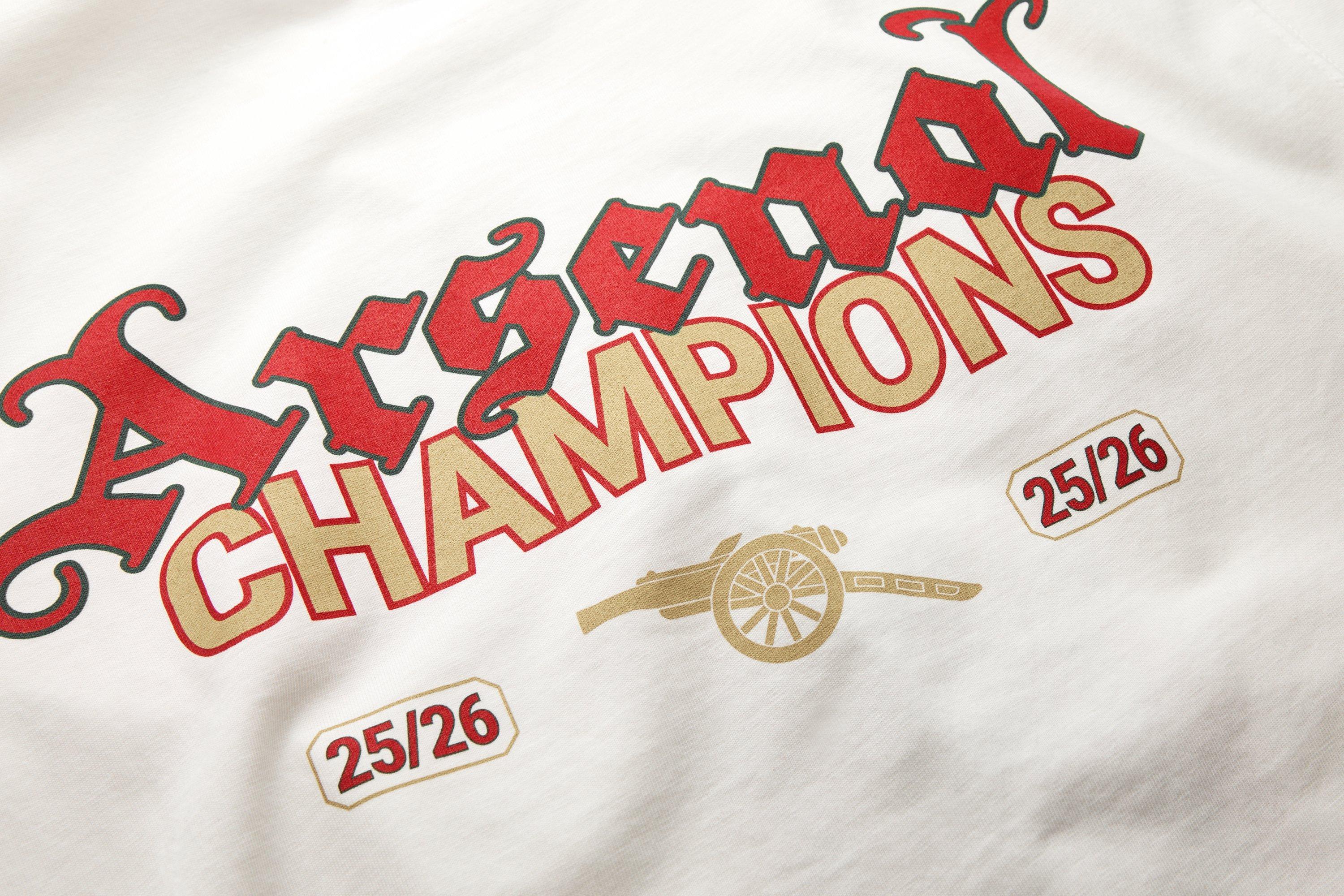 Arsenal Gothic Champions 25/26 White Crew T-Shirt | Official