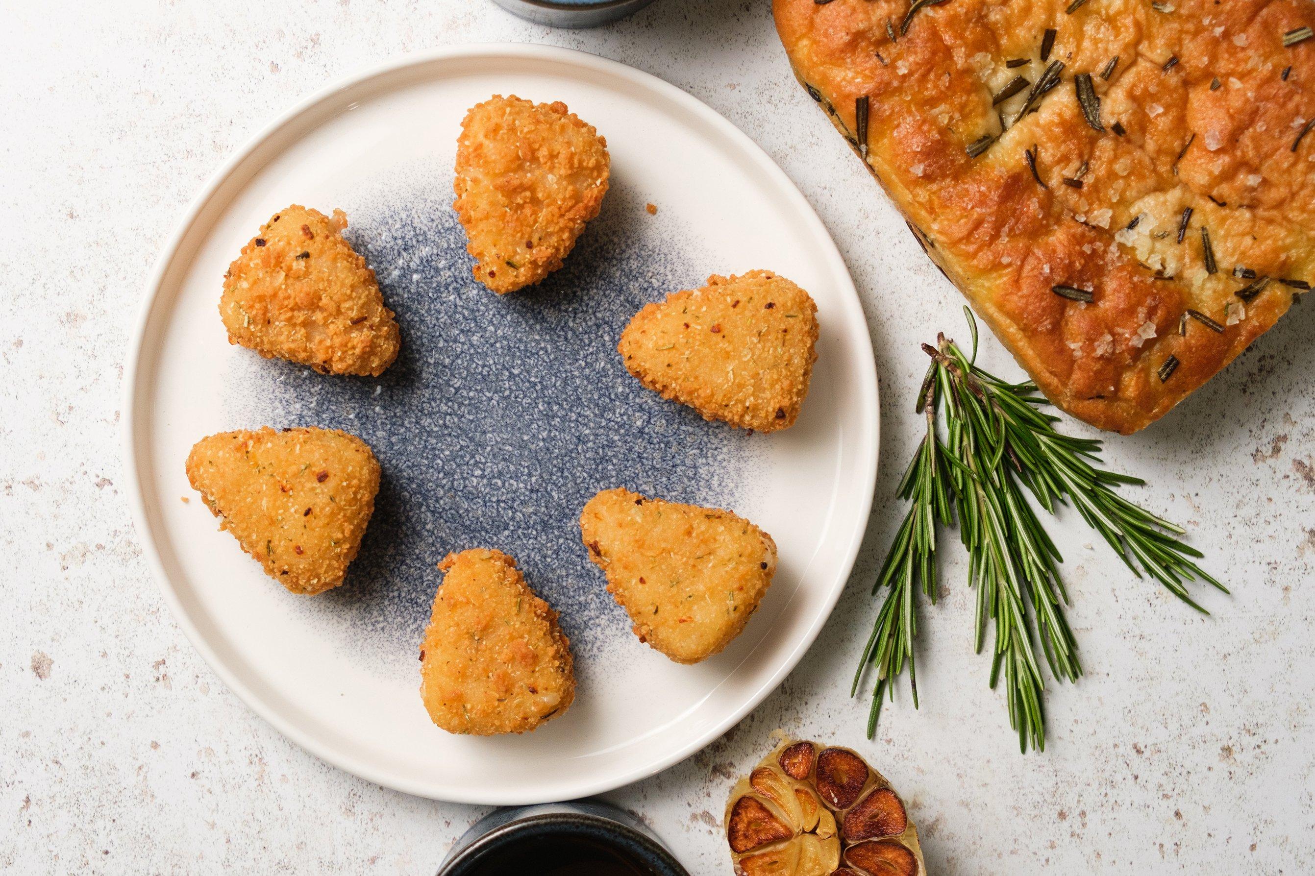 Carisma Panko Coated Rosemary & Garlic Brie Wedges