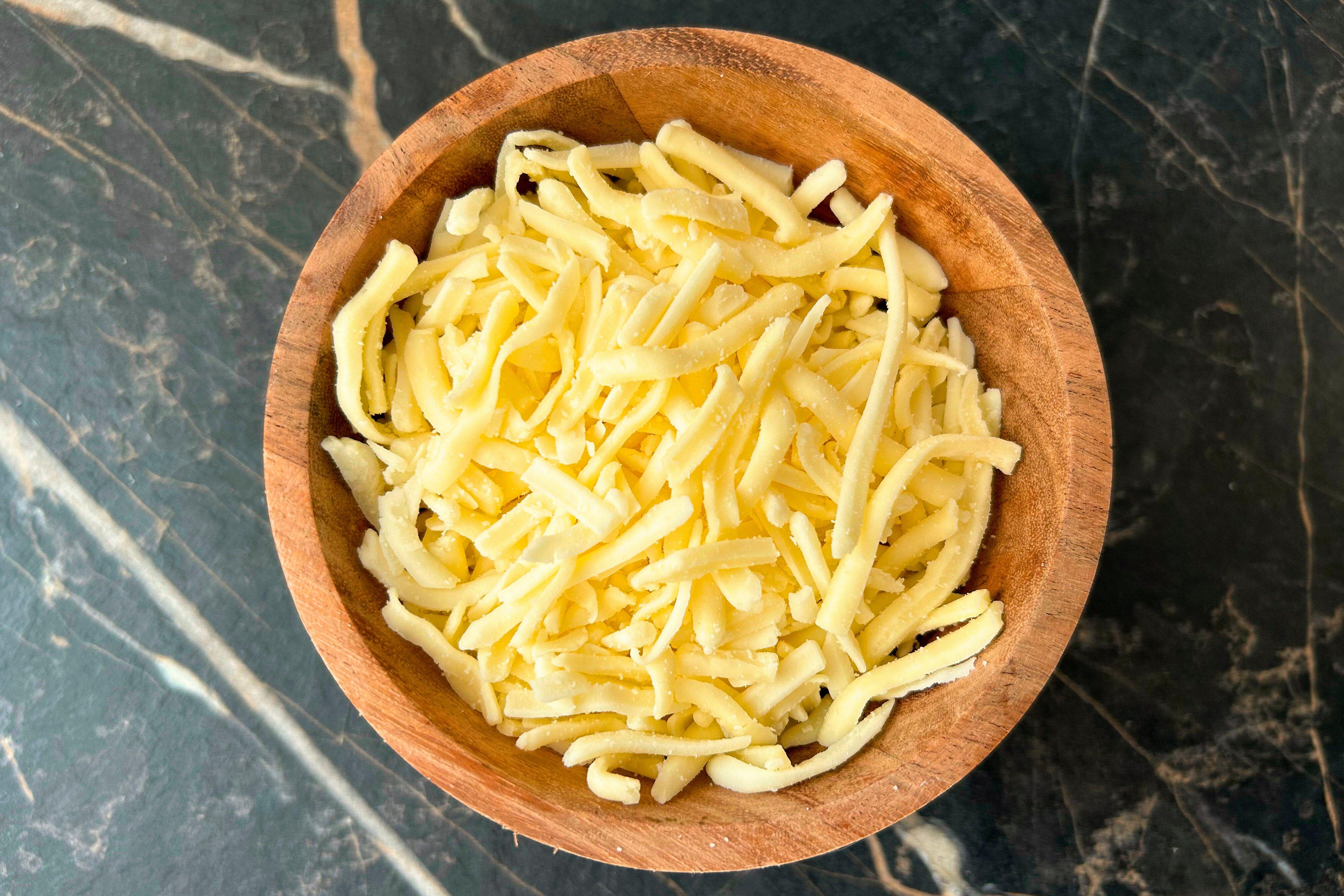 Essential Melts Grated Analogue & Mild Cheddar Cheese