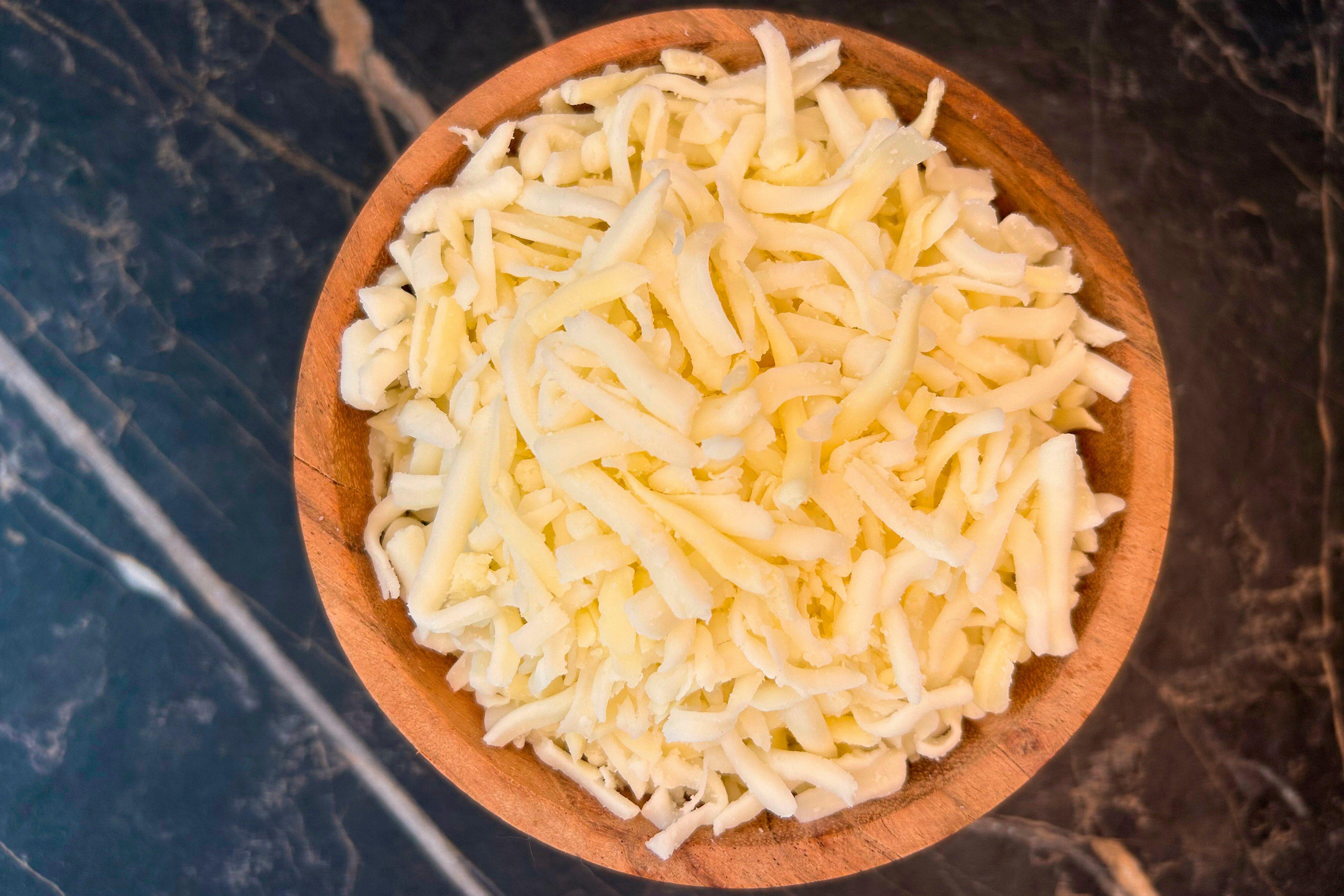 Essential Melts Grated Analogue & Mature Cheddar Cheese