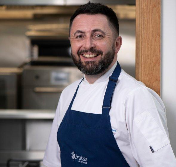 Brakes Scotland development chef advising customers on menu options