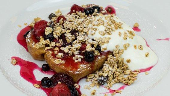 French Toast Topped with Organic Yoghurt, Granola & Red Berry Compote