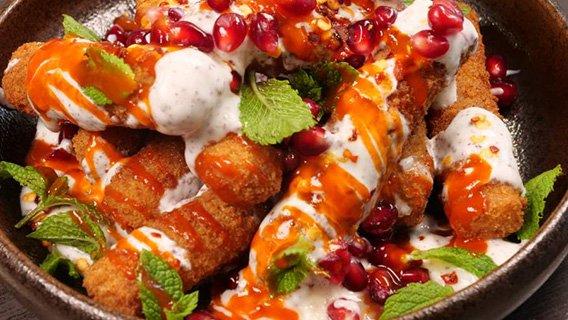 Halloumi fries with yoghurt, pomegranate, mint & sumac