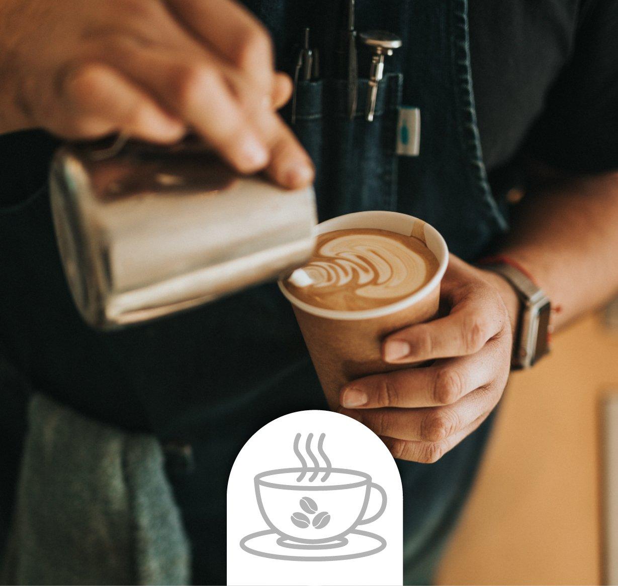 Barista making a coffee in a coffee shop