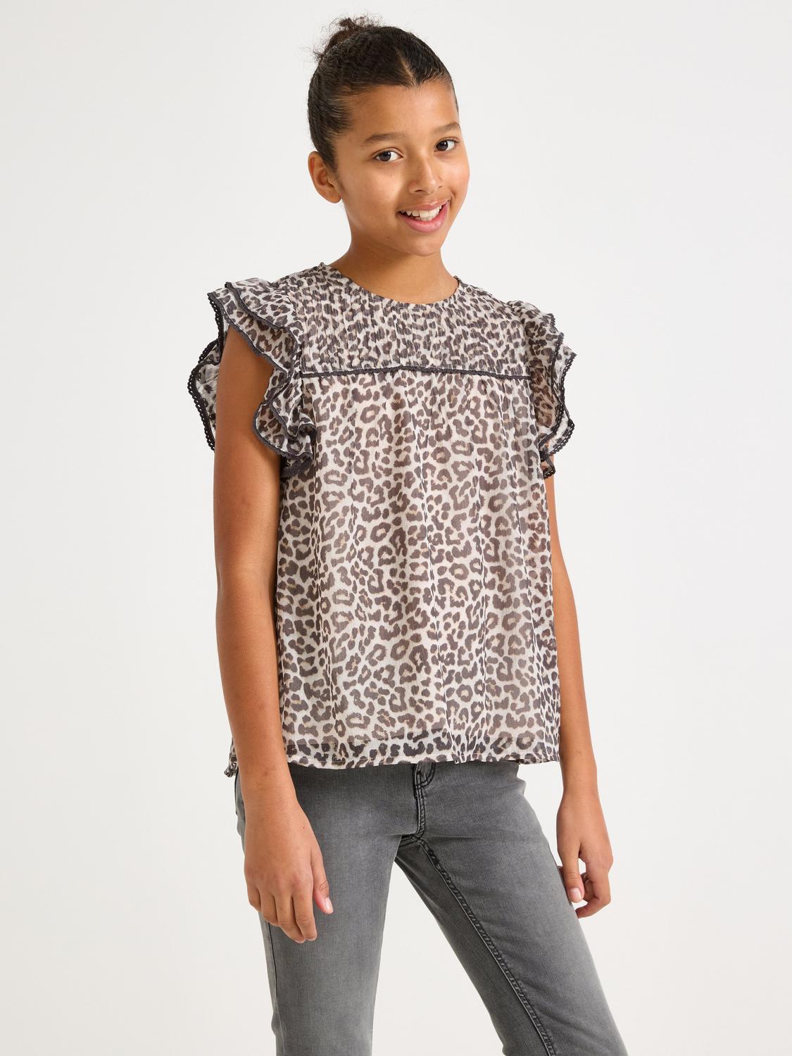 Blus med volanger