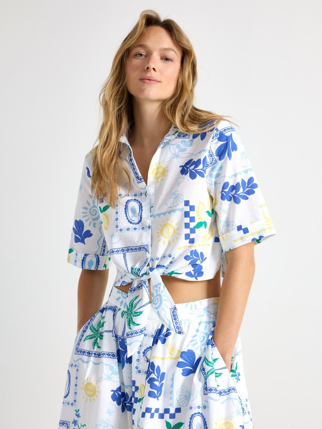 Blus med knytmidja