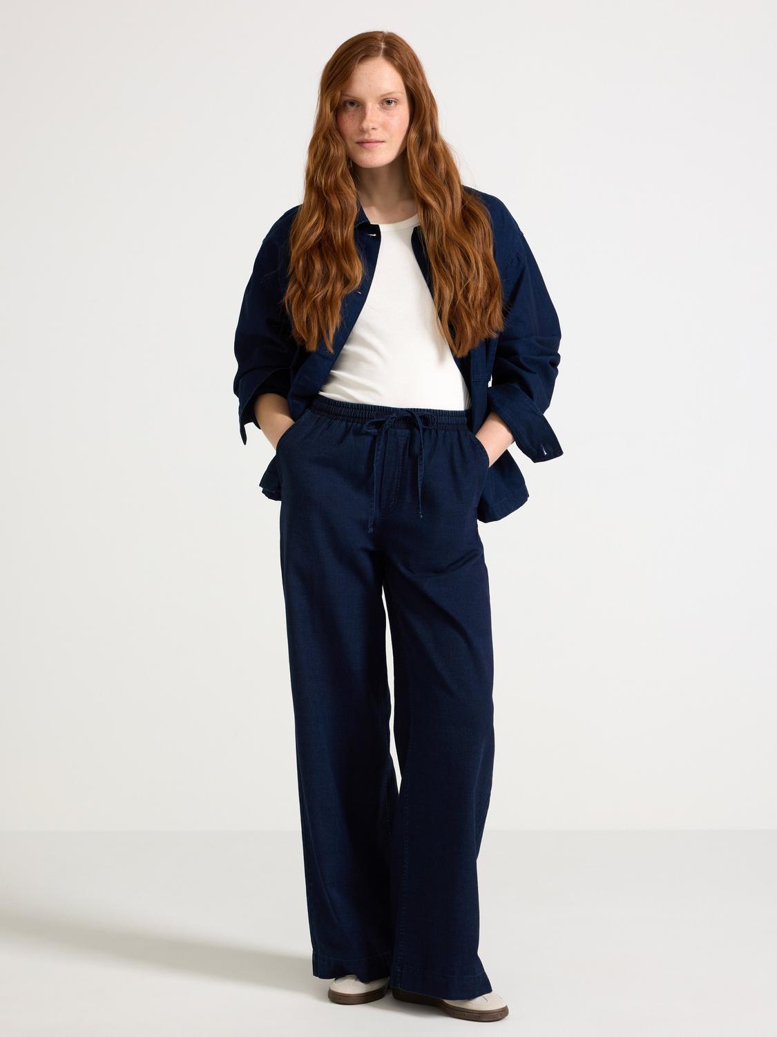 Denimbyxa med dragsko