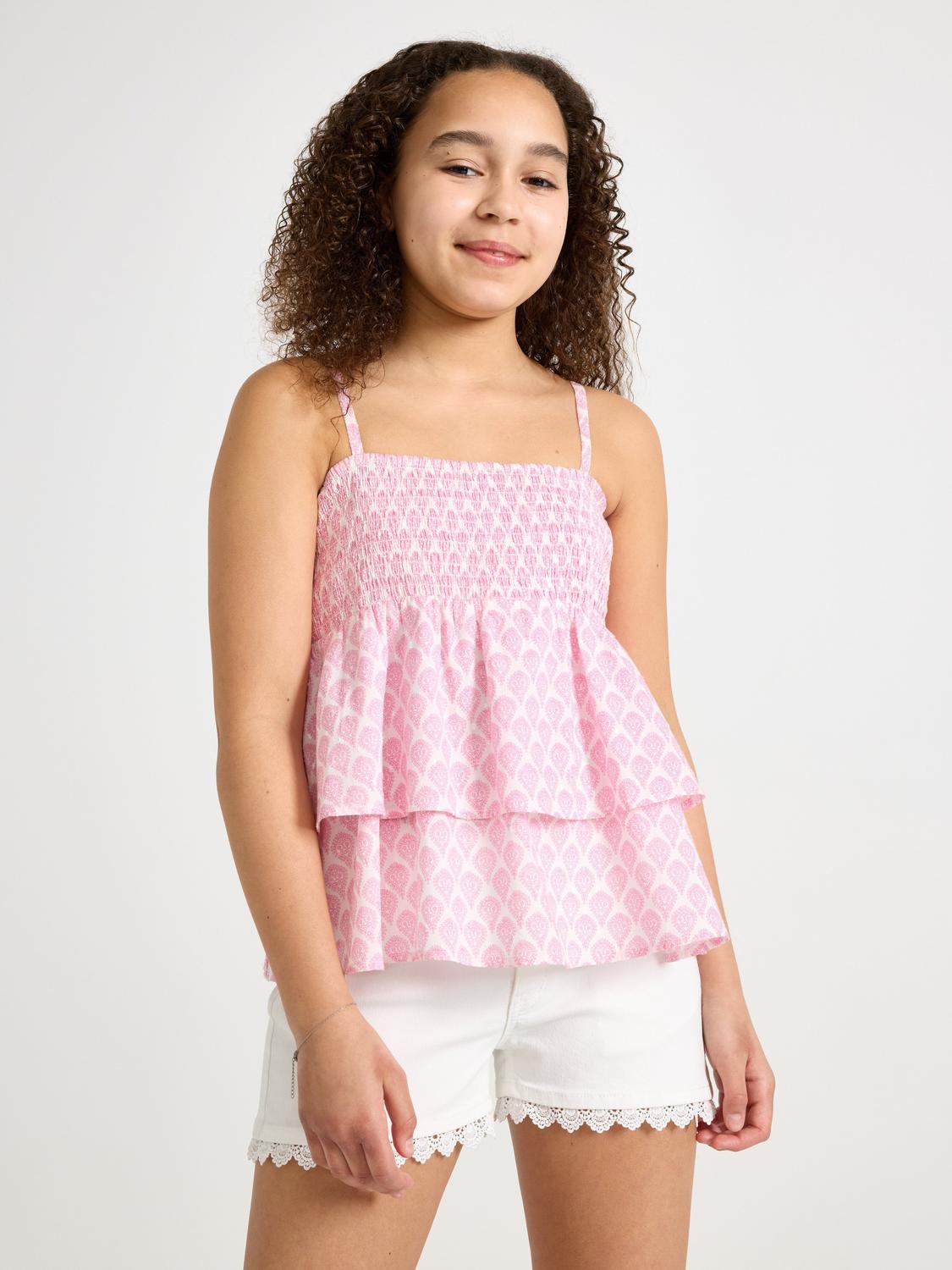 Vävd topp med volanger