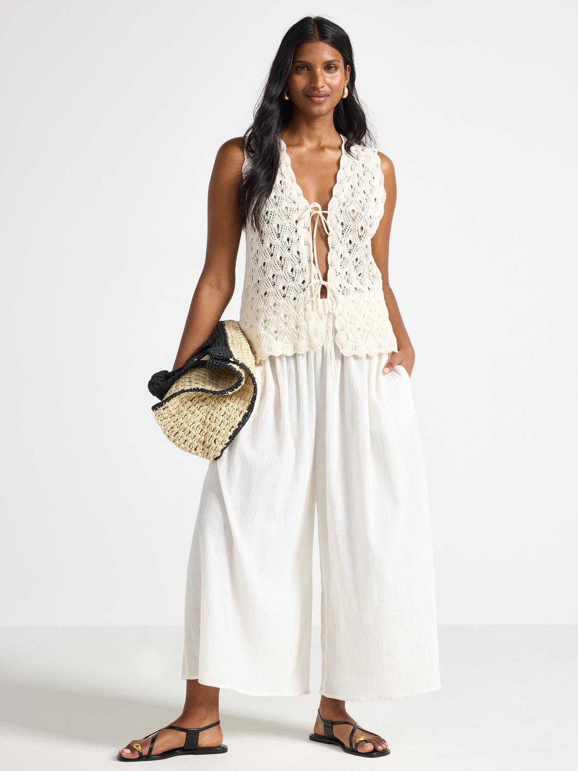 Croppade byxor med vida ben