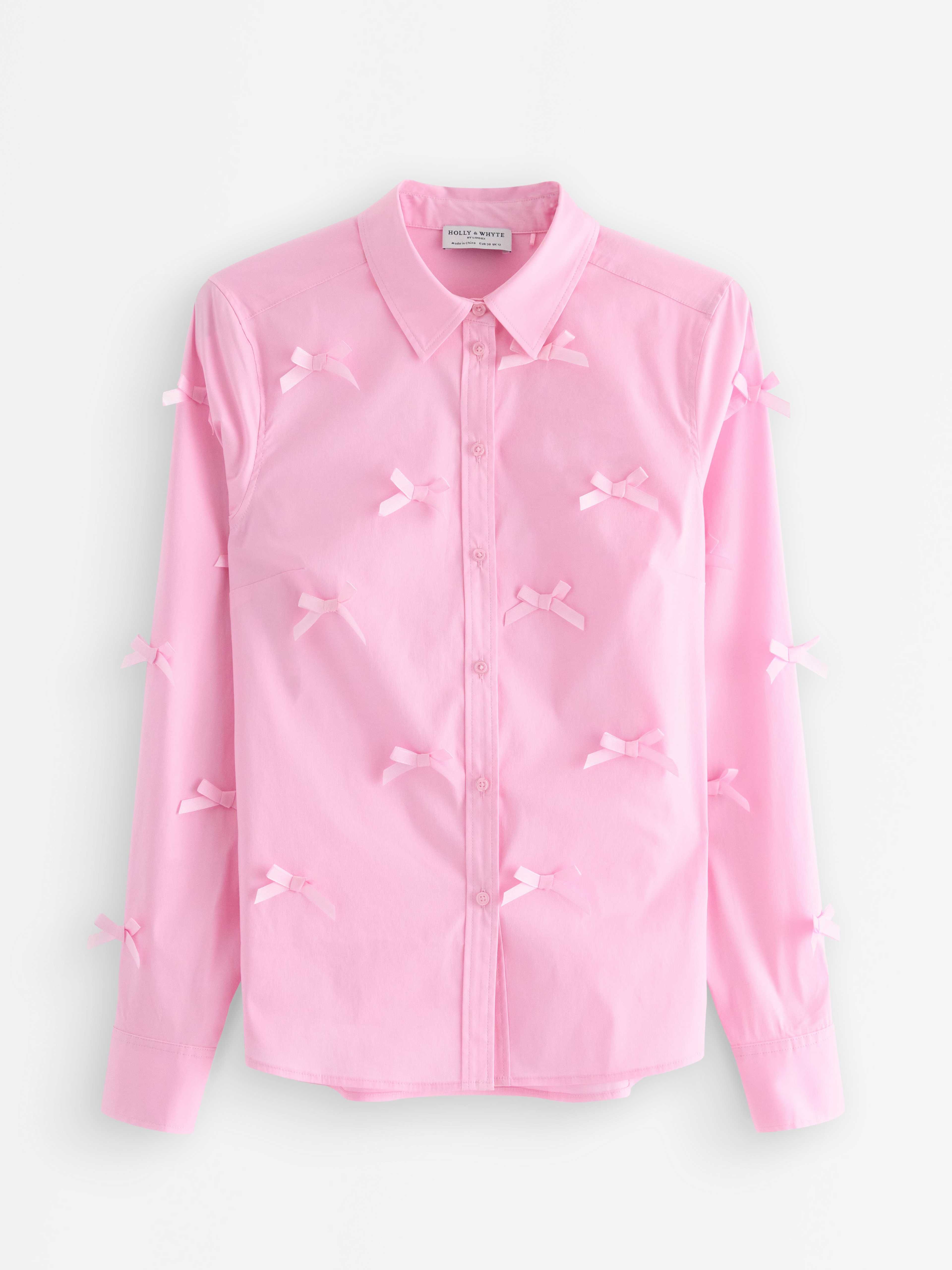 Skjorta med rosetter i satin