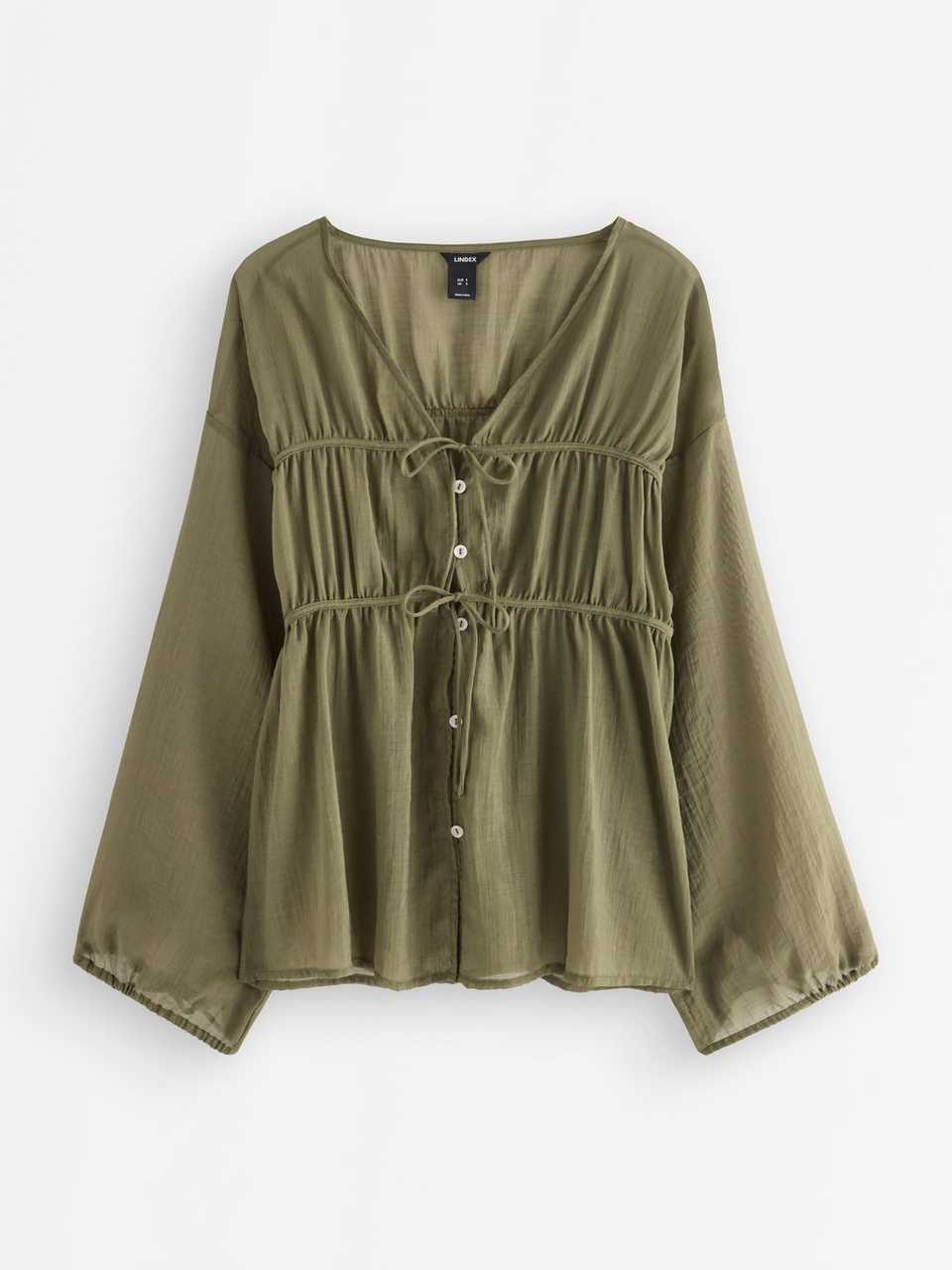 Blus med knytband