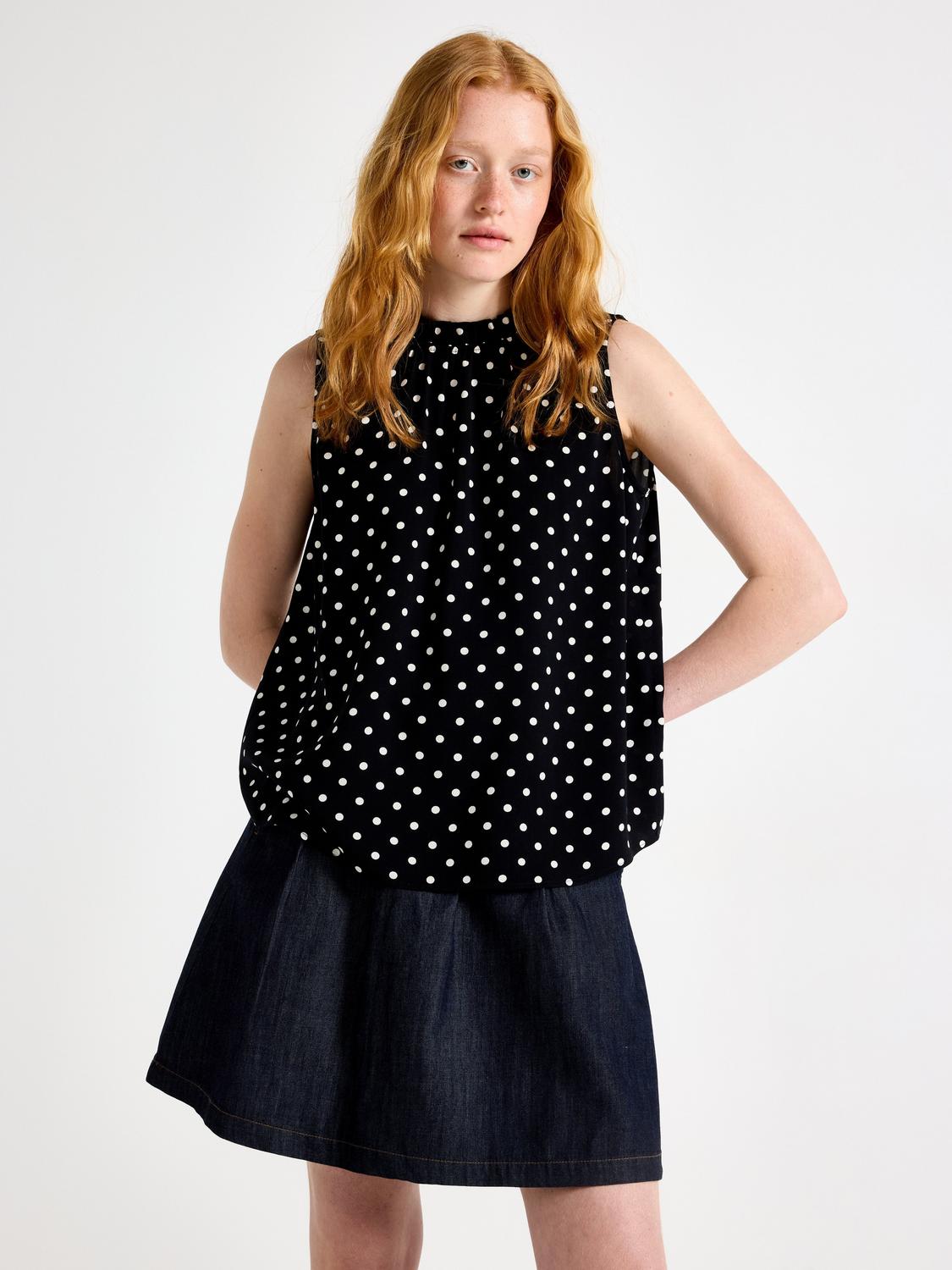 Ärmlös blus