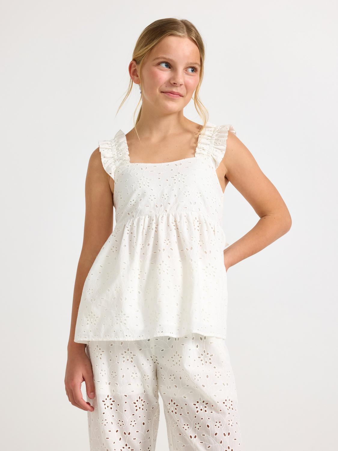 Ärmlös blus med broderie anglaise