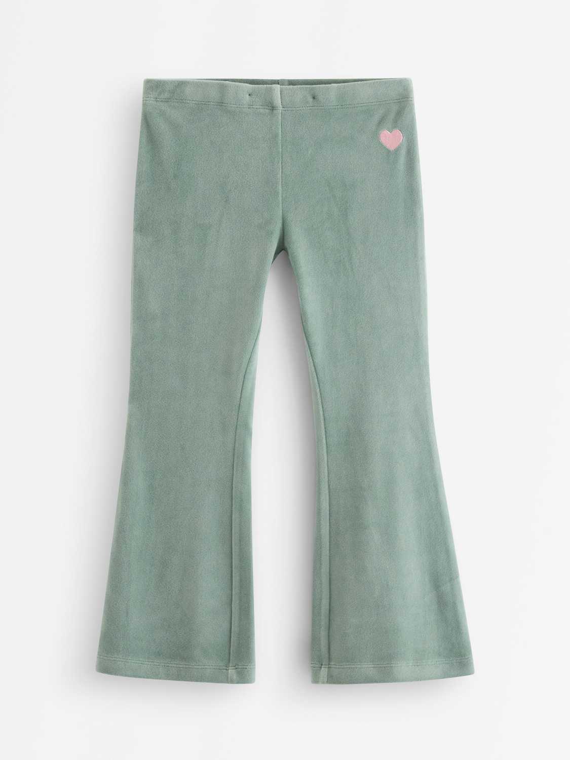 Enfärgade utsvängda leggings i velour