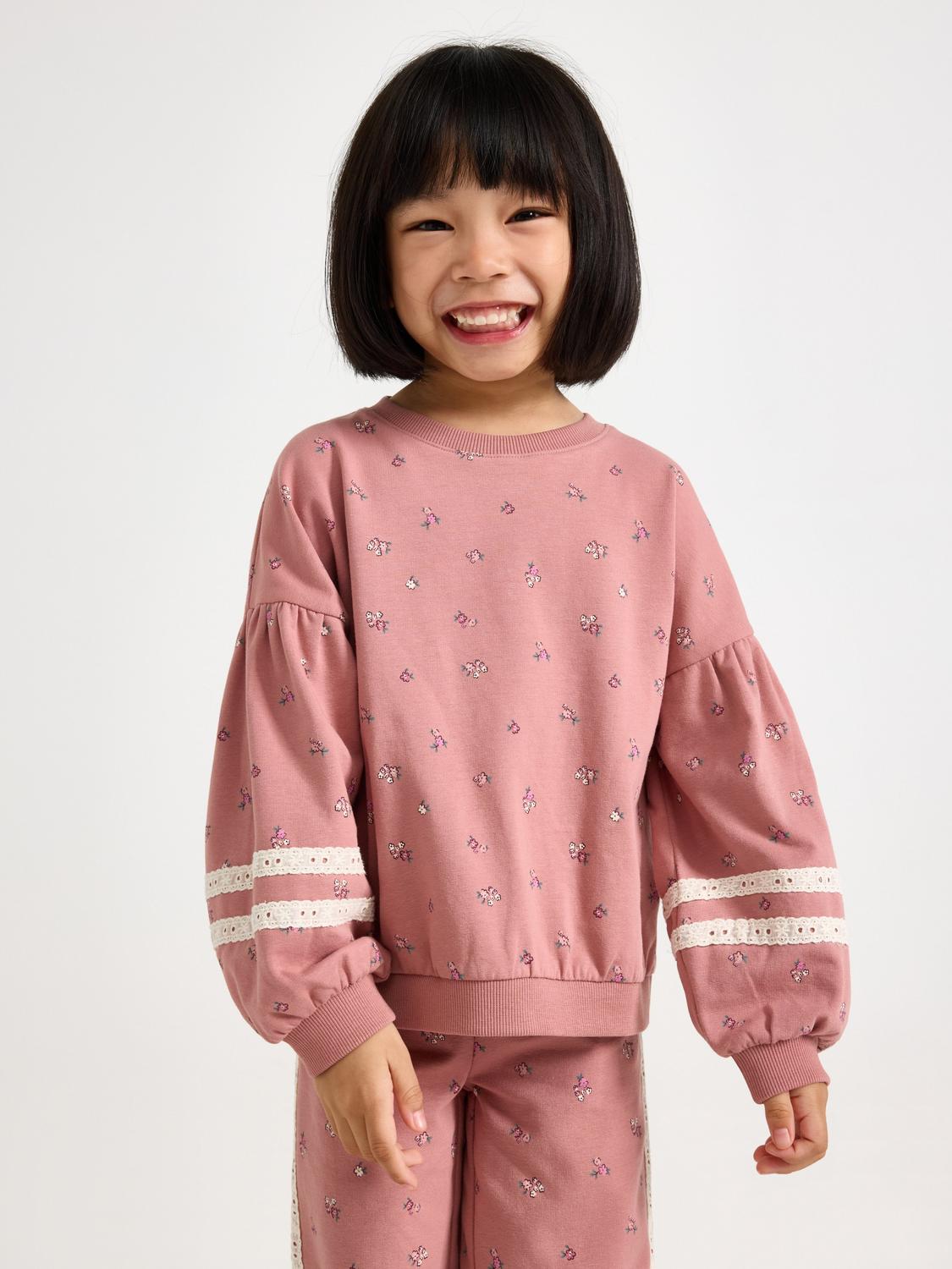 Croppad sweatshirt med puffärm