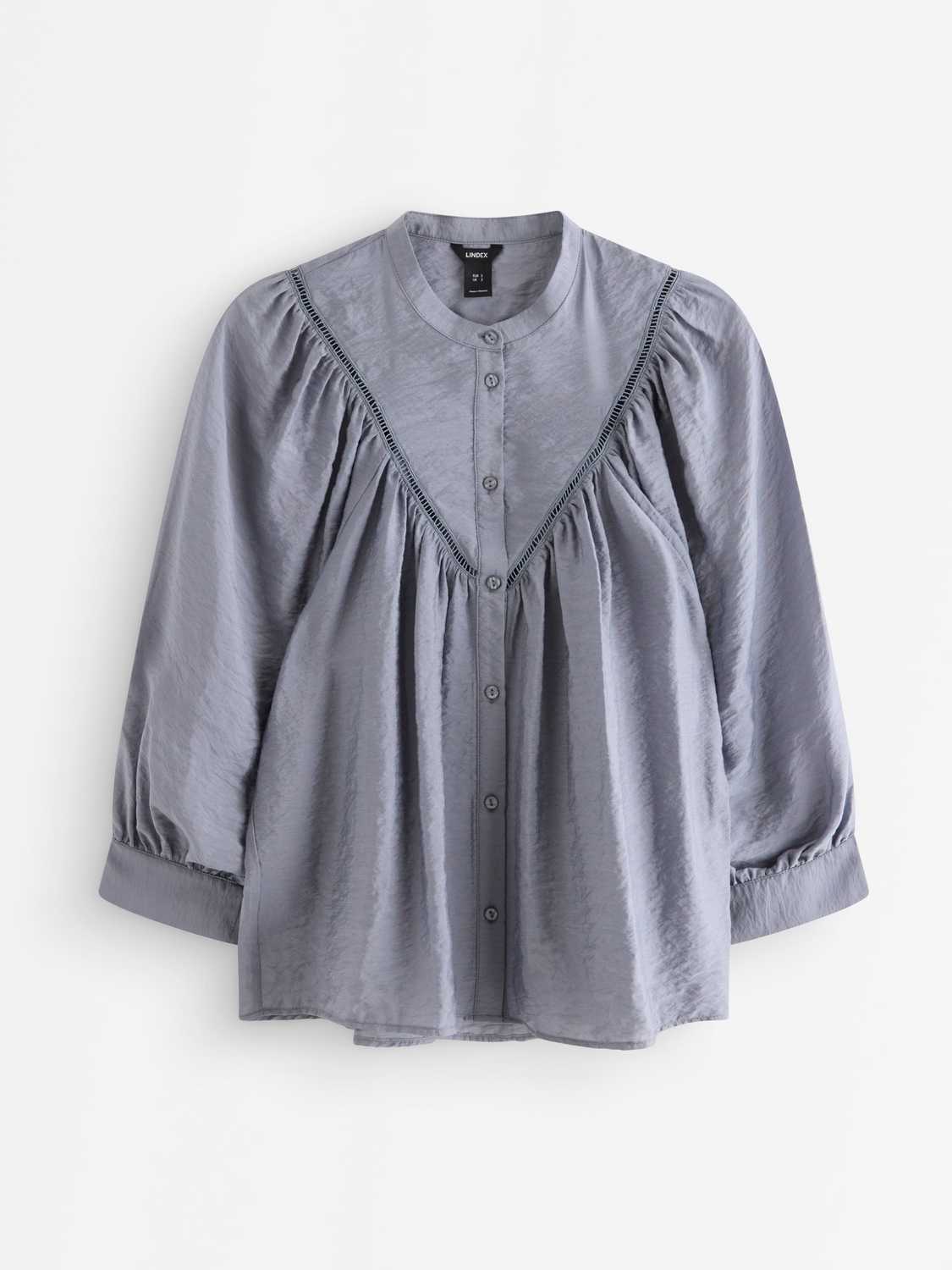 Blus med puffärmar
