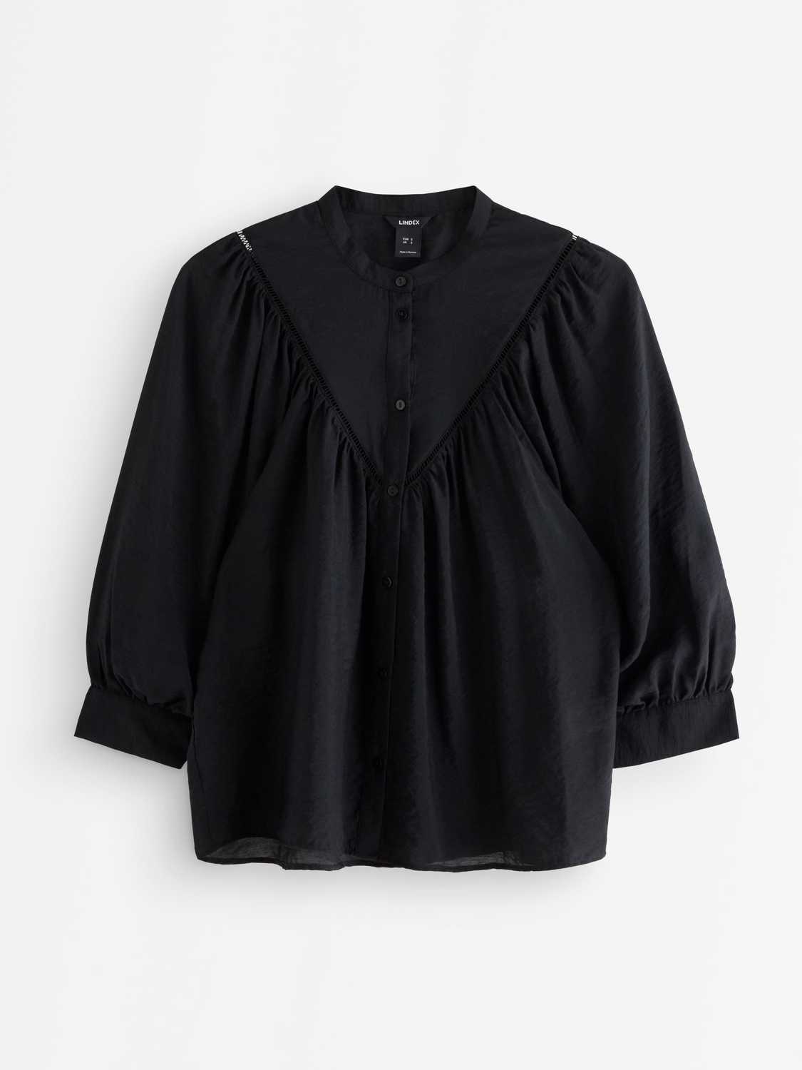 Blus med puffärmar