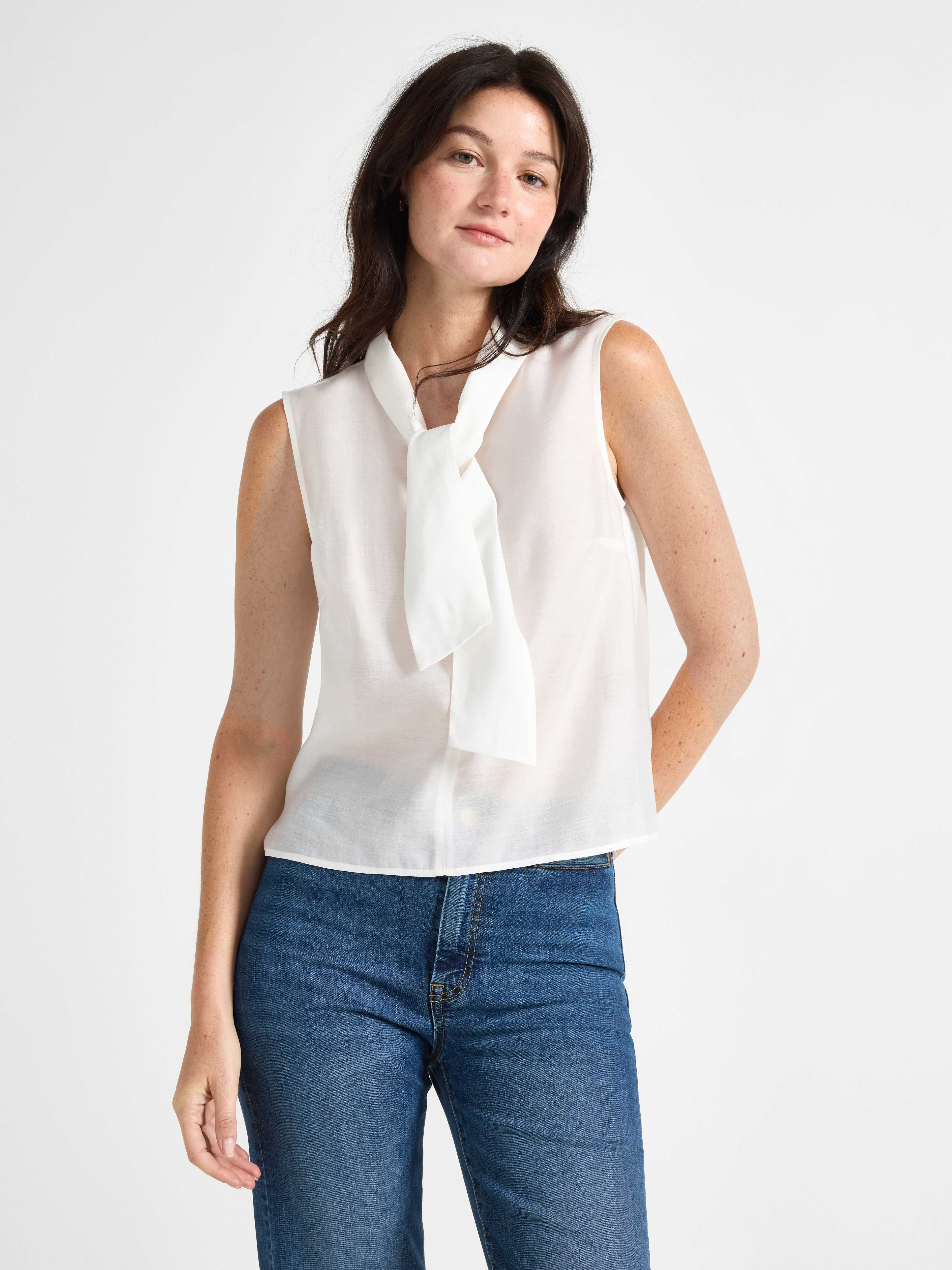 Ärmlös blus med rosett