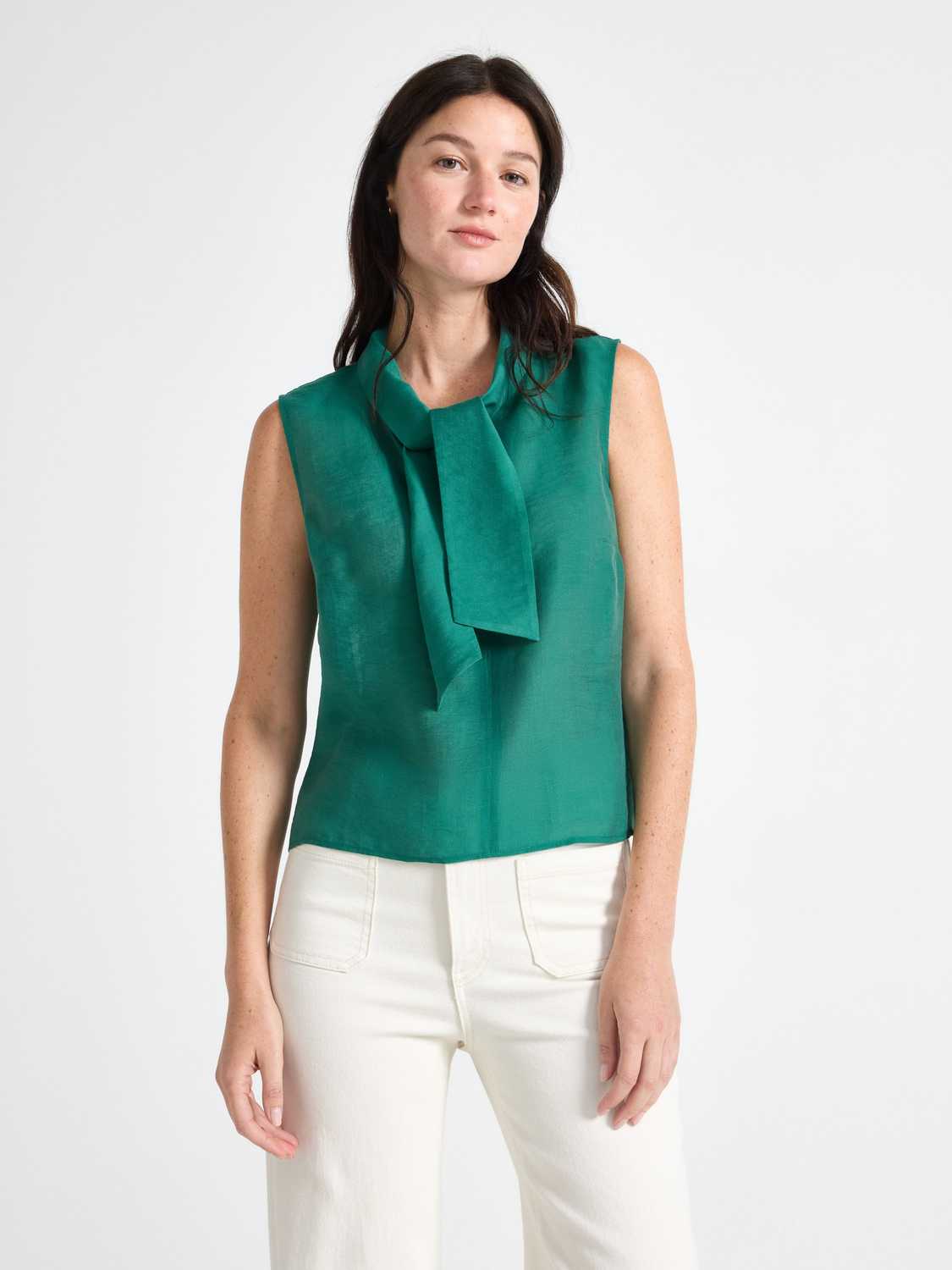 Ärmlös blus med rosett