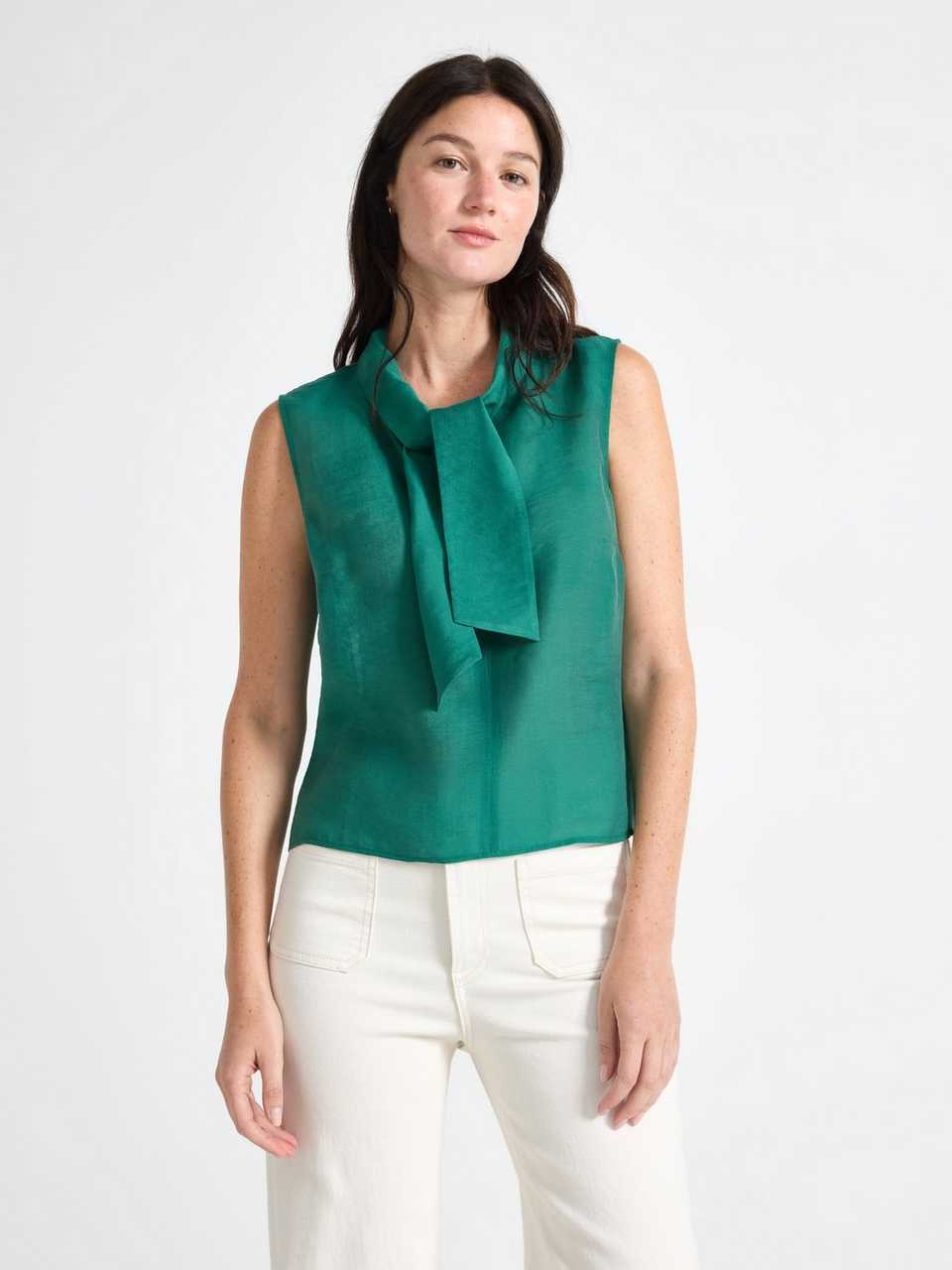 Ärmlös blus med rosett
