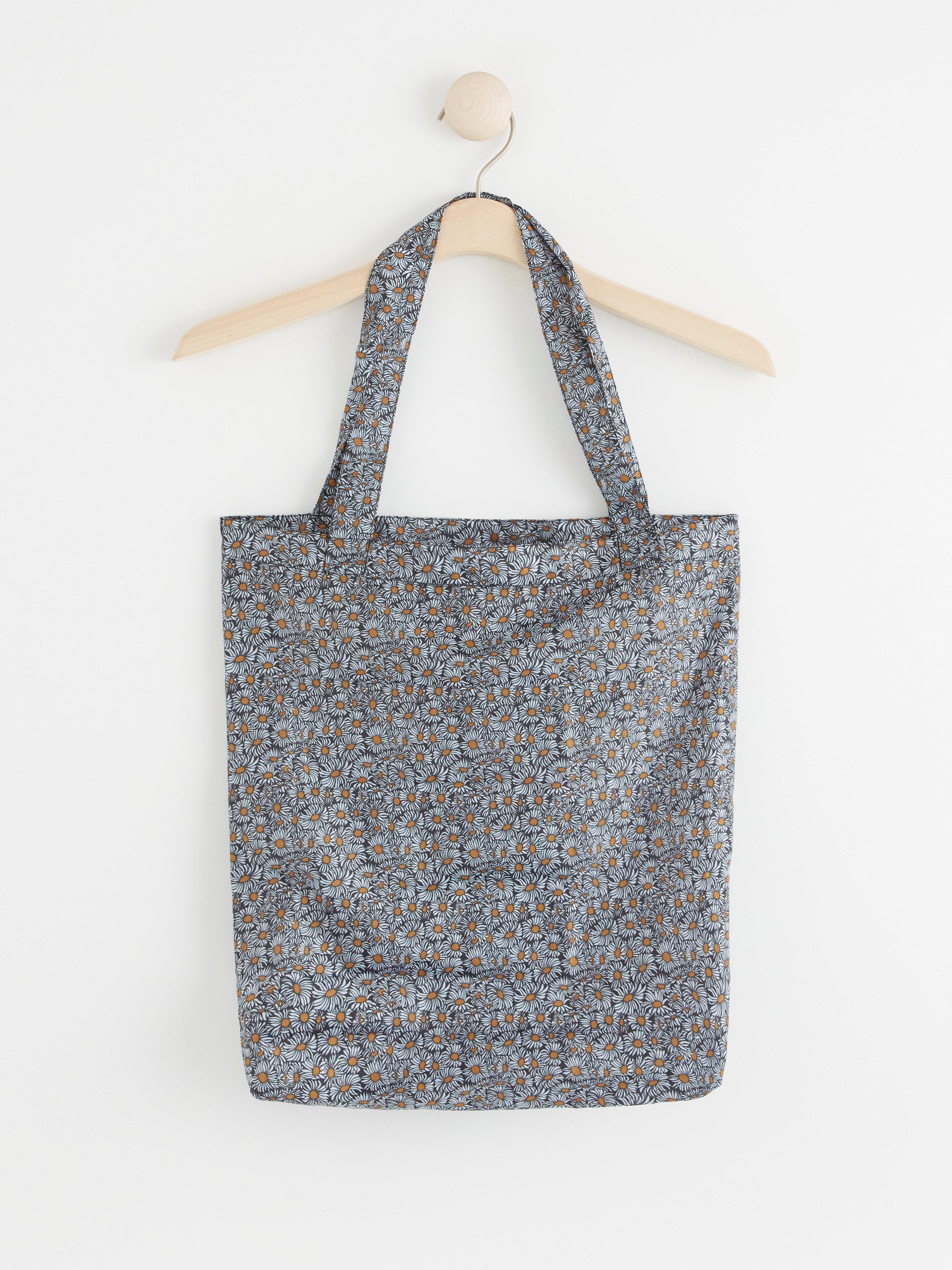 Kokoontaitettava shopper-kassi