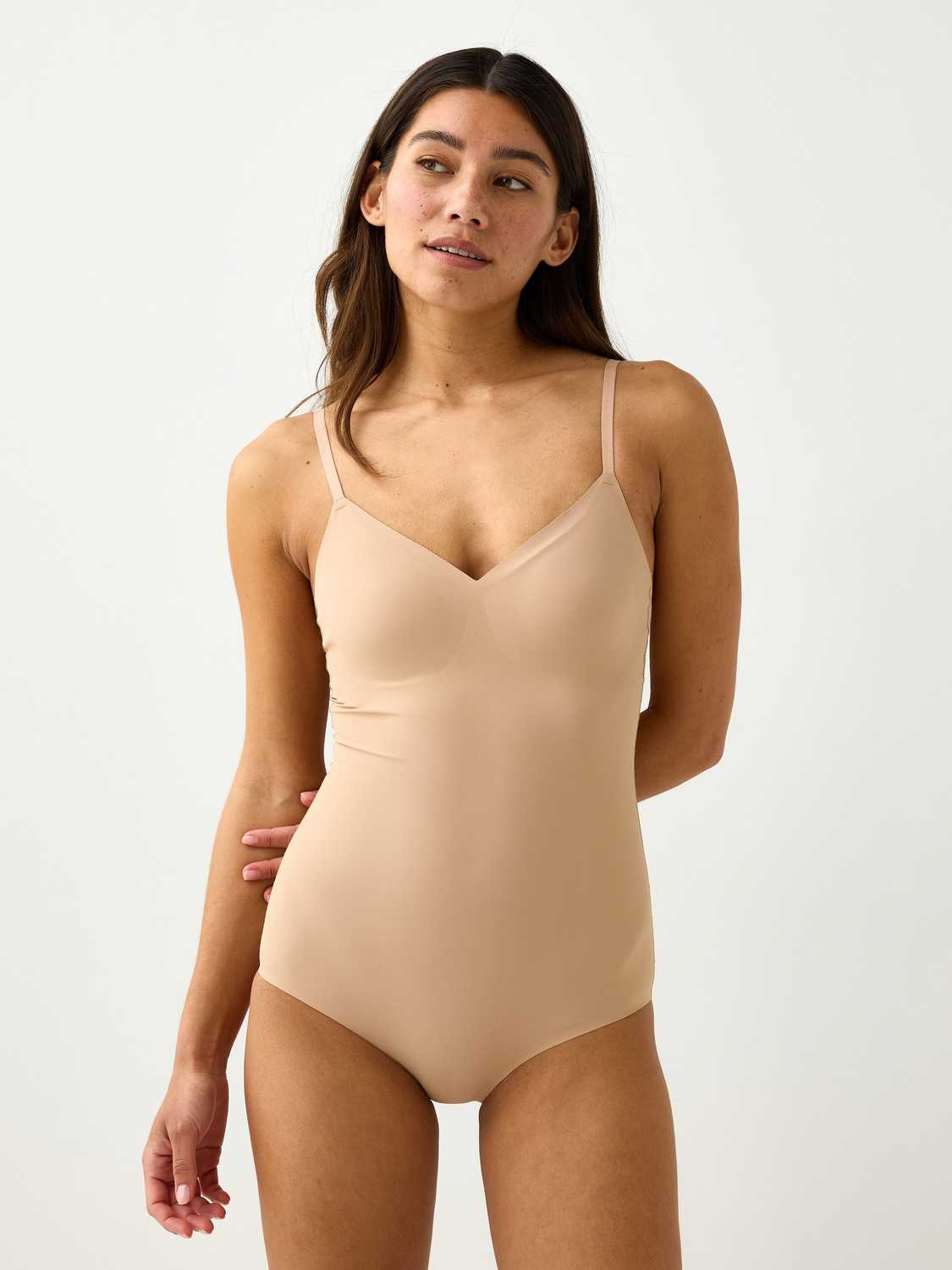 Invisible medium support shaping body
