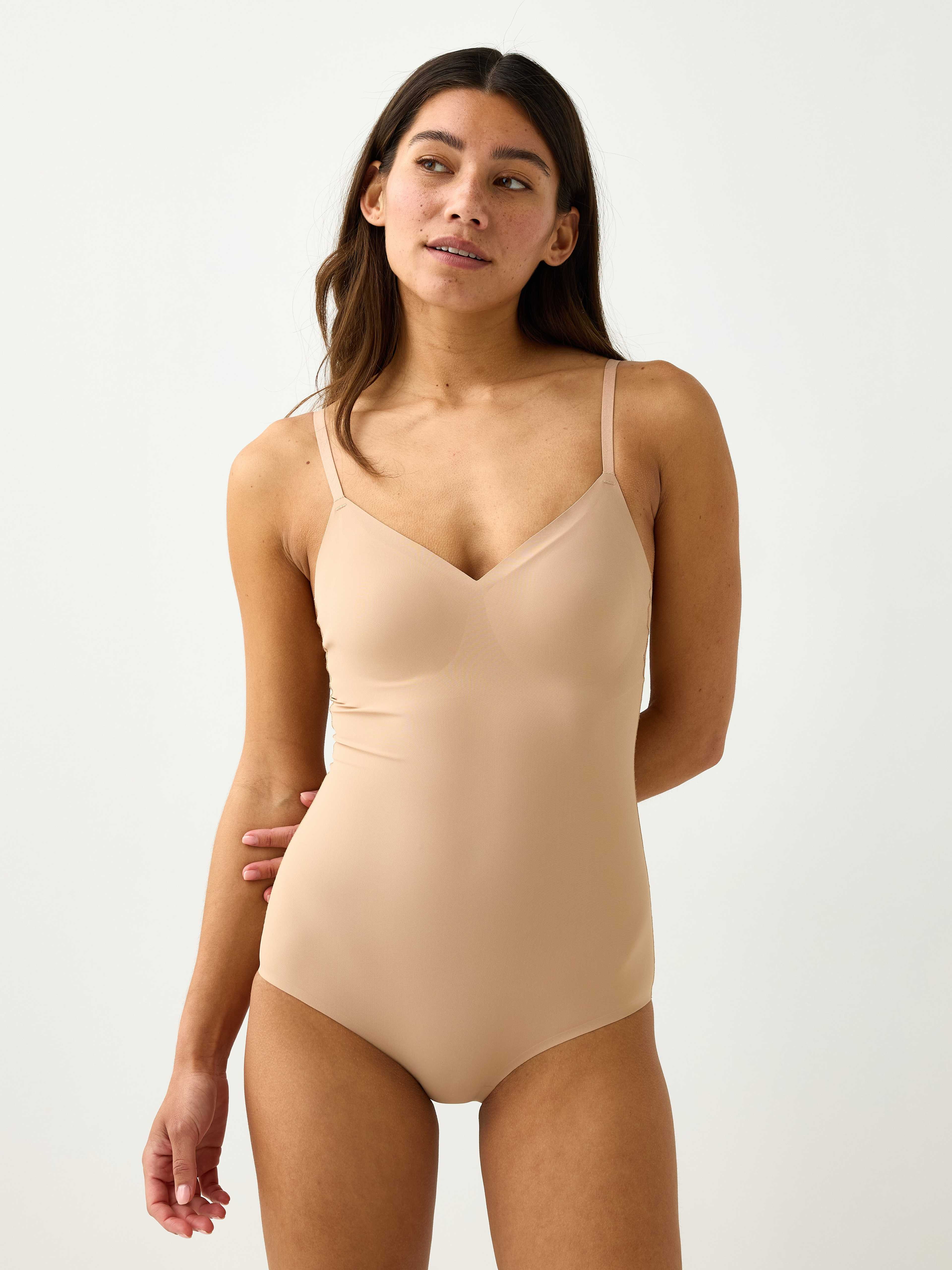 Invisible medium support shaping body