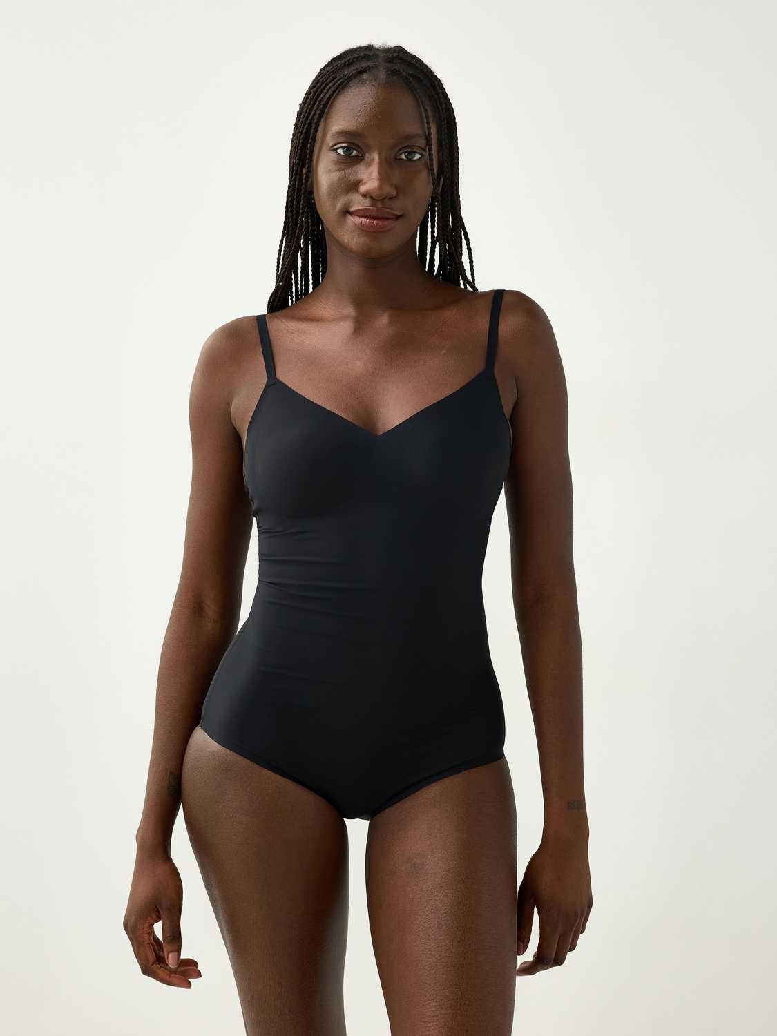 Invisible medium support shaping body