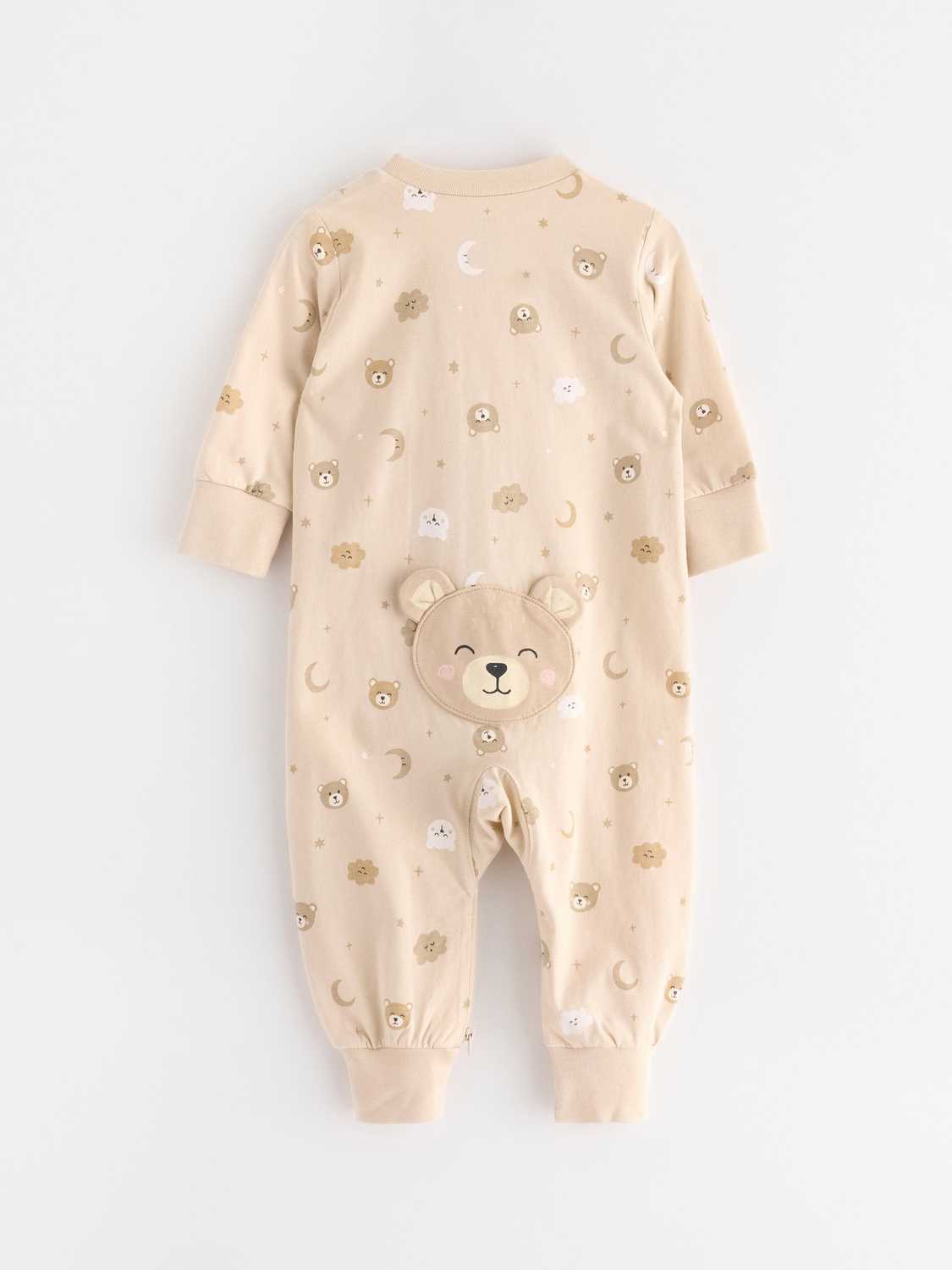 Pyjamas med applikation baktill