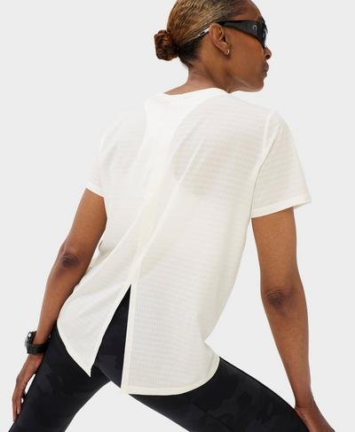 Ultimate Track Pants Perforated Split Back Tee, Lily White | Sweaty Betty