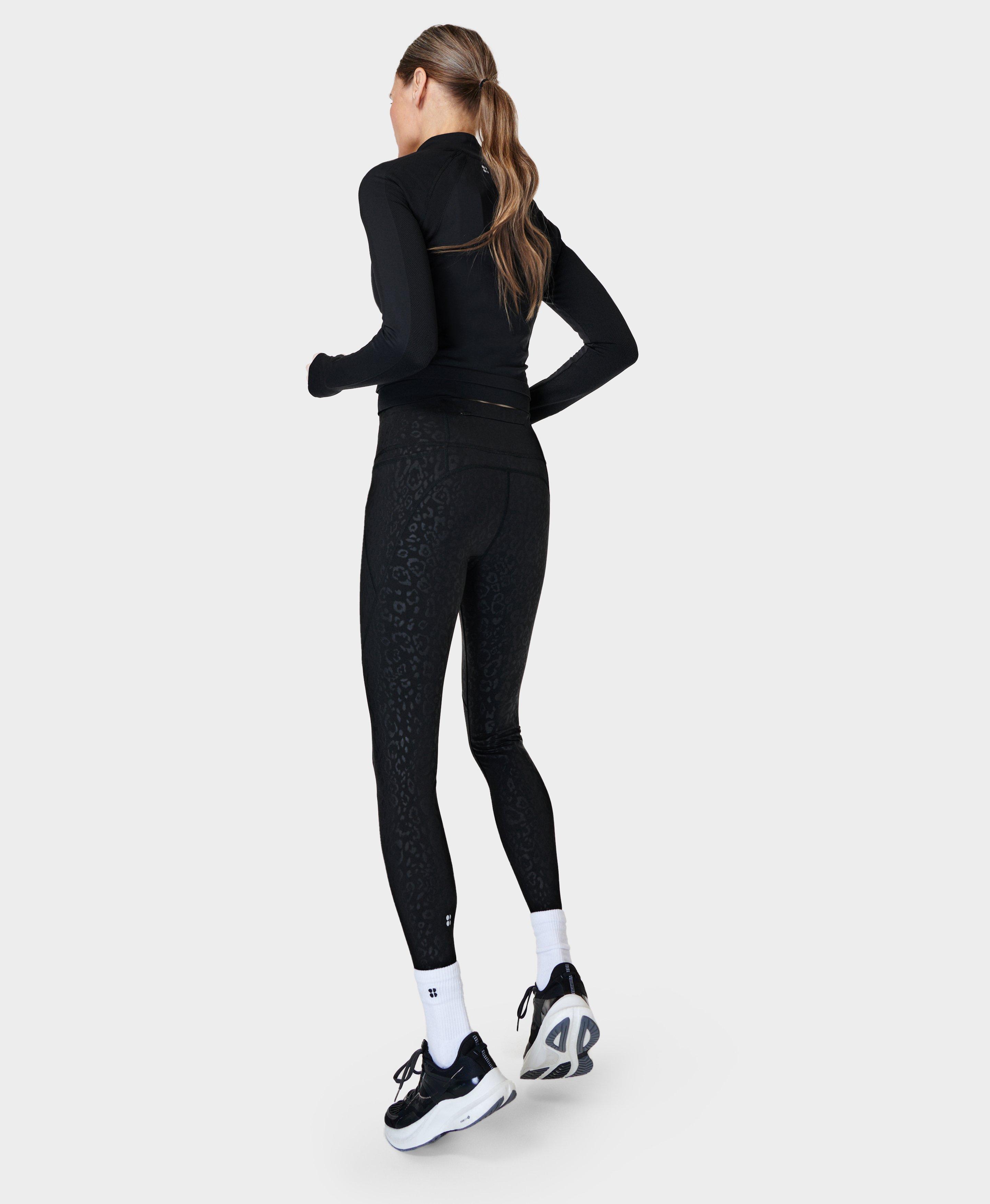 Nike Pro Training tonal leopard print leggings in black | ASOS