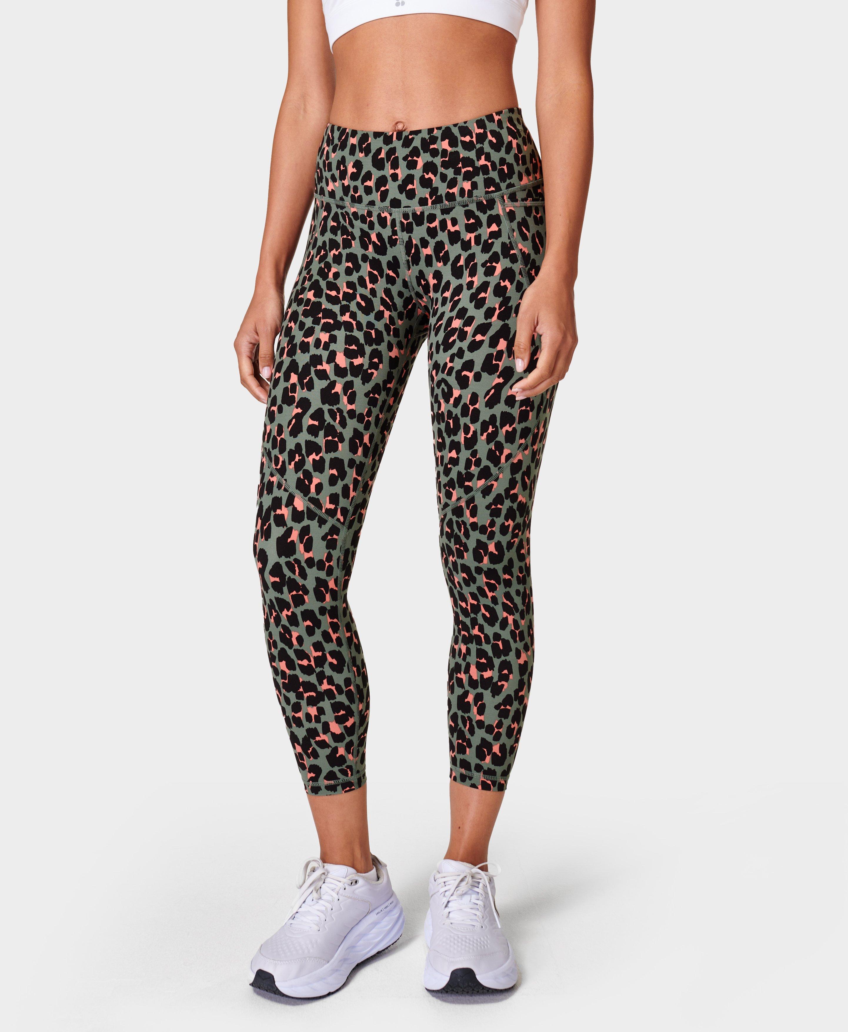 Nike Women's One Luxe Tight Fit Mid Rise Cheetah Print Leggings  (White/Black, X-Small)