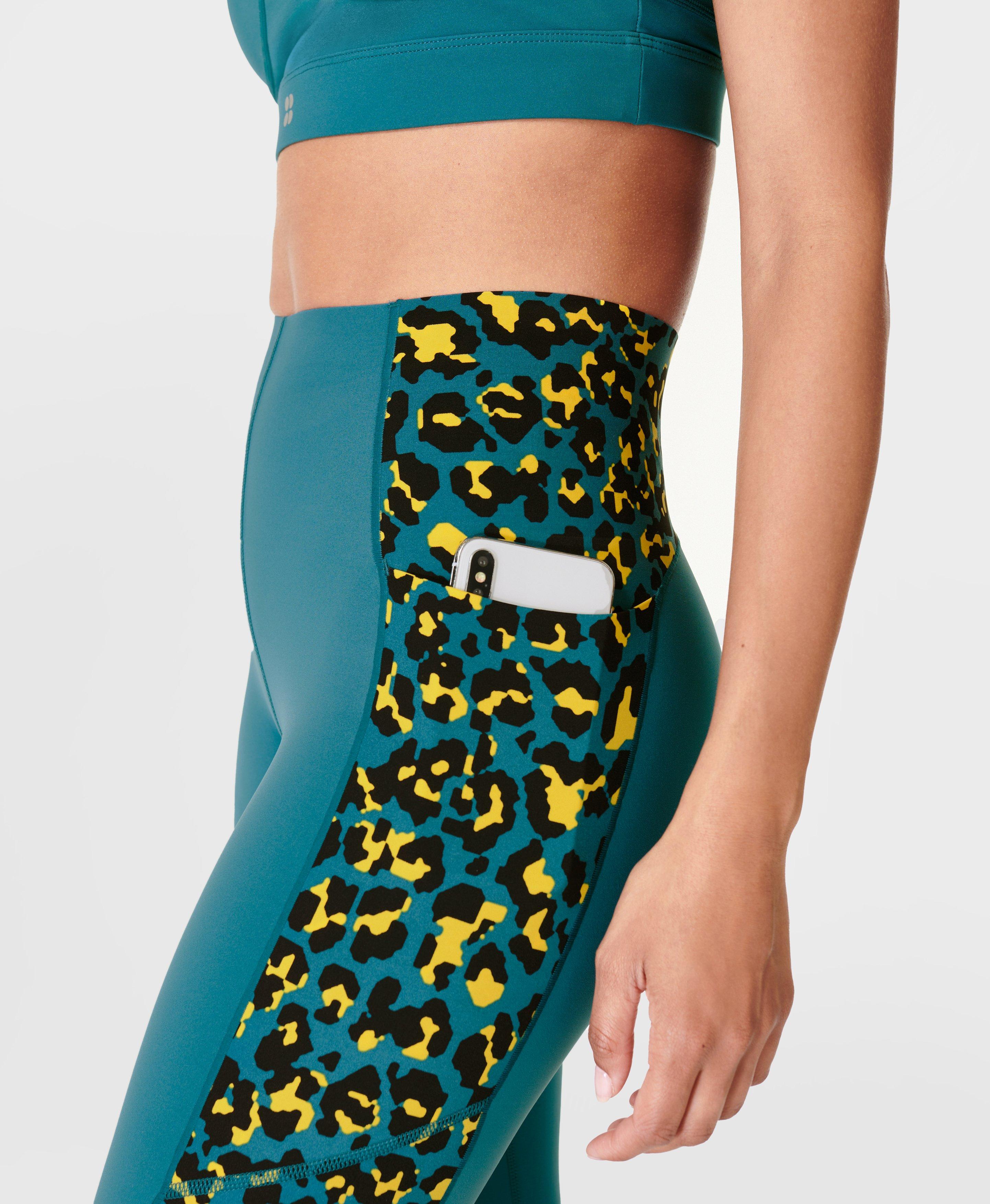 https://cdn.media.amplience.net/i/SweatyBetty/sb6438z_bluepixelleopardprint_78length_6?$pdp_mobile_pwa$&fmt=auto