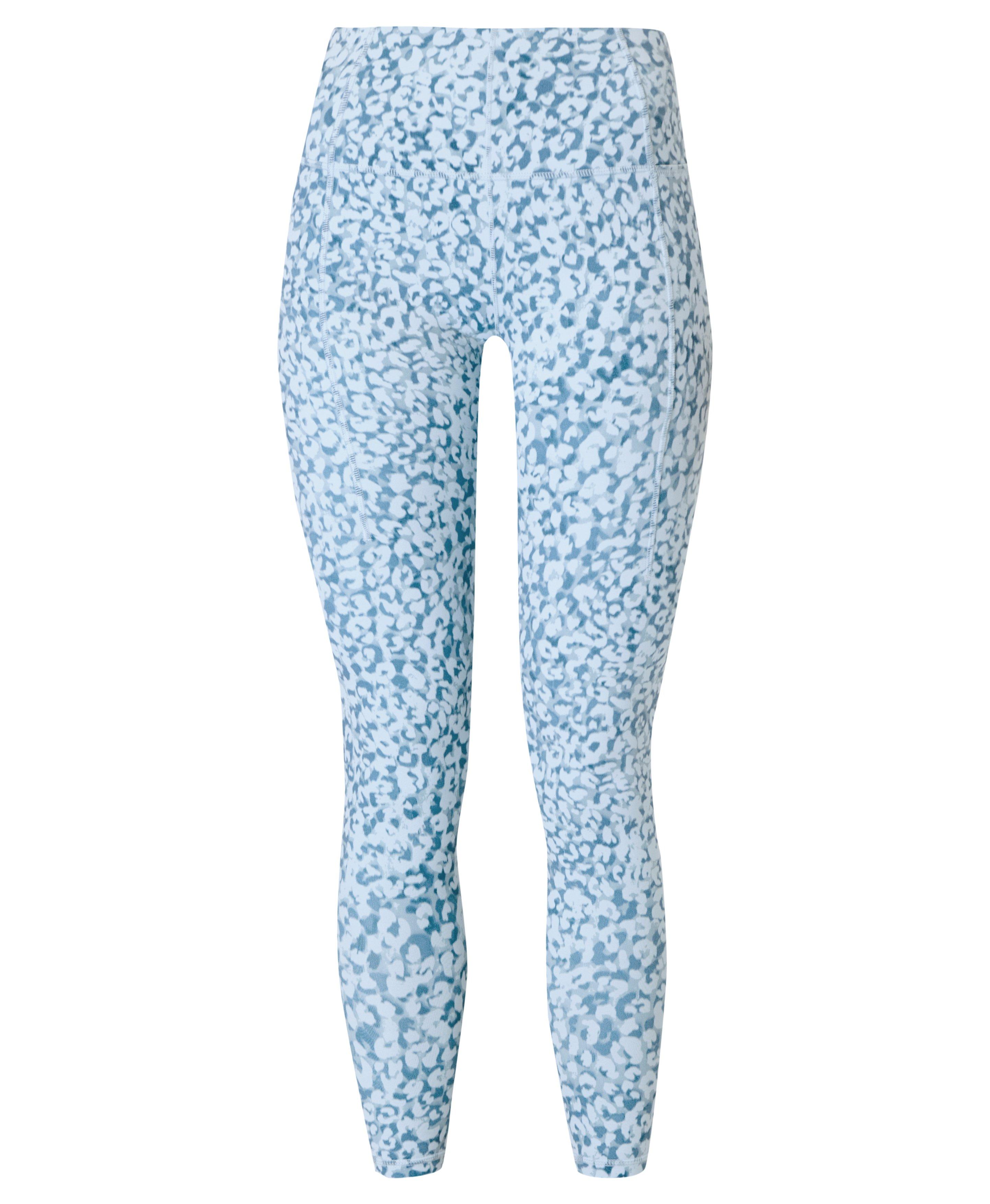 Winter snowflakes white on blue crisp, cool and pretty Leggings for Sale  by headpossum