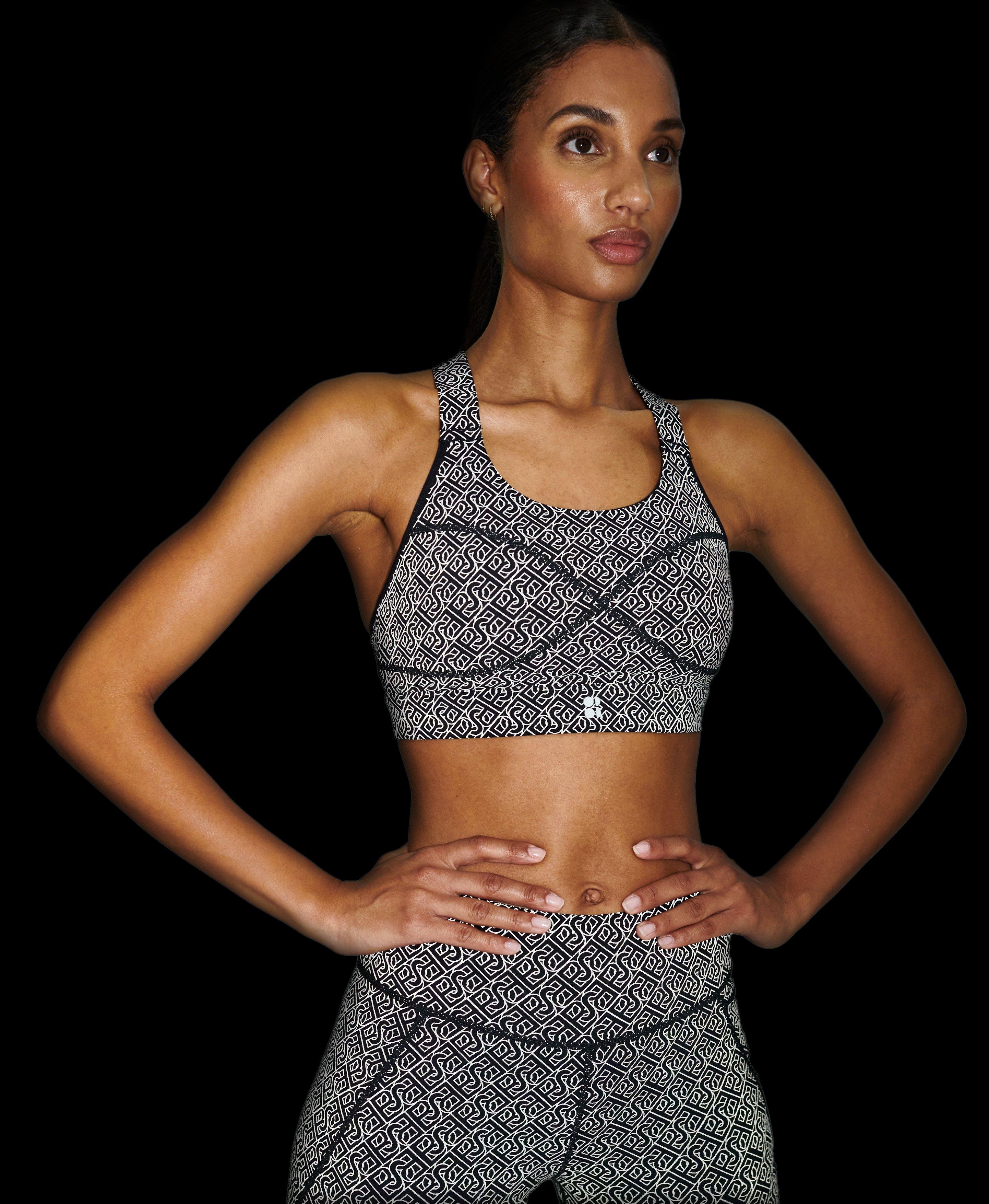 Sweaty Betty Power Racerback Sports Bra In Black Triangle Construct Print