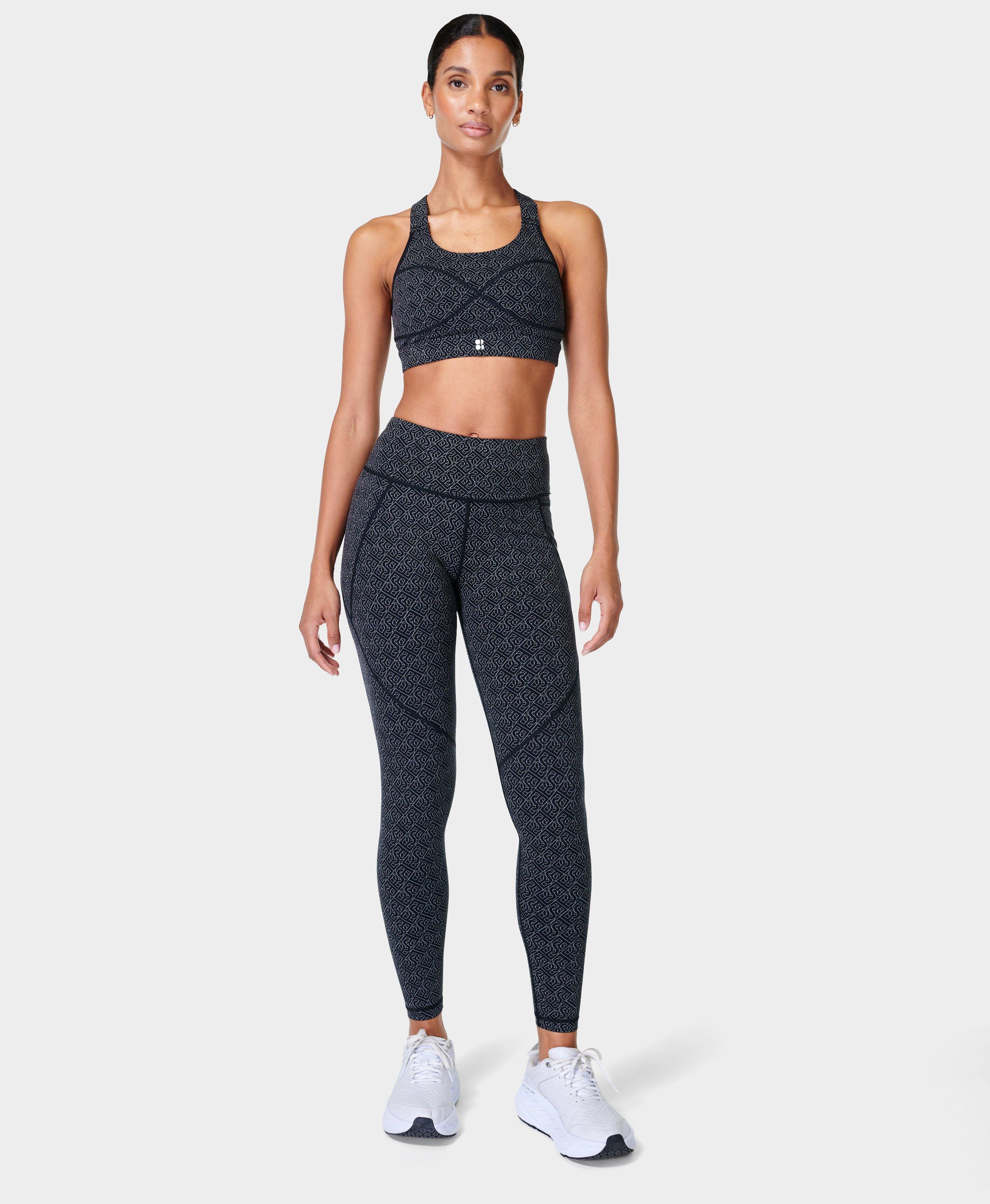 Medium Impact Padded Sports Bra & High Rise Active Tights with Side Pocket  in Black