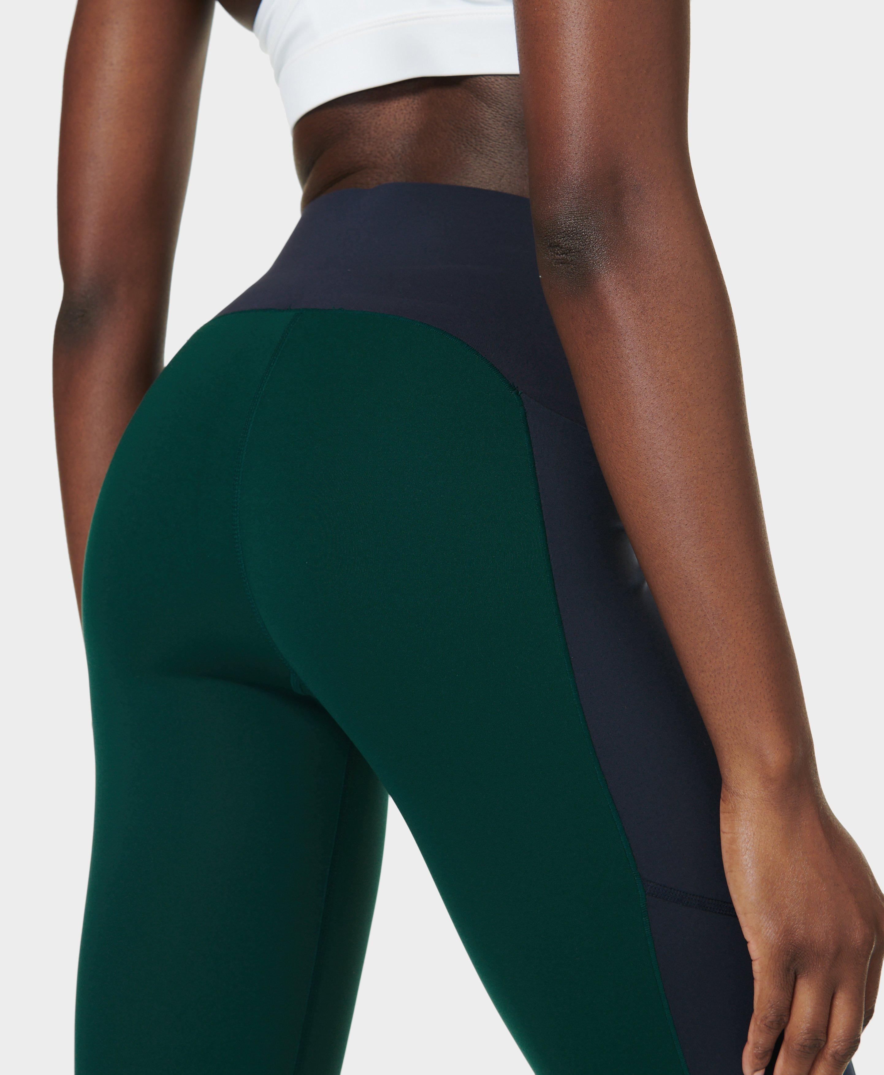 Nike training colourblock leggings in blue on sale