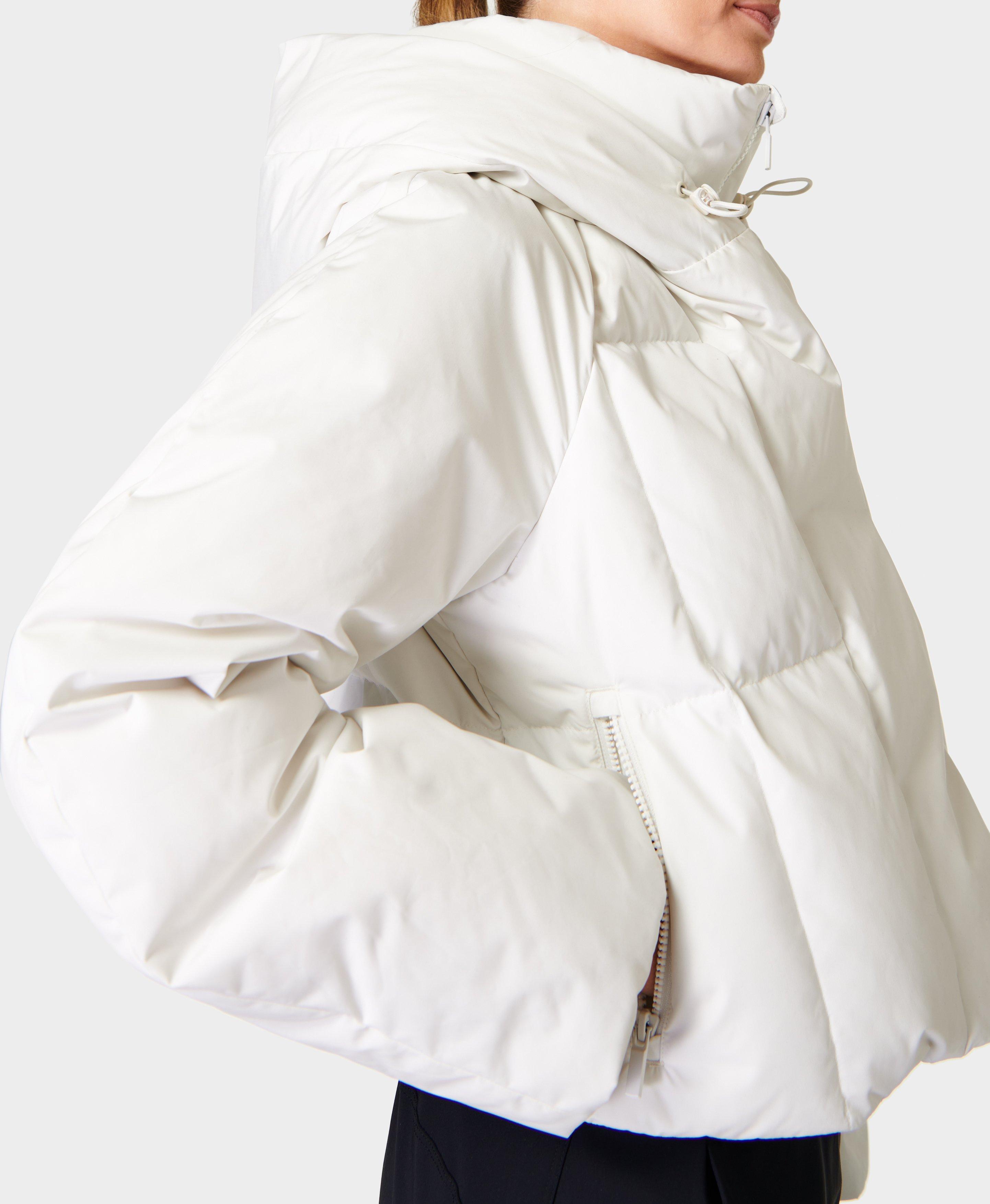 White puffer ski store jacket